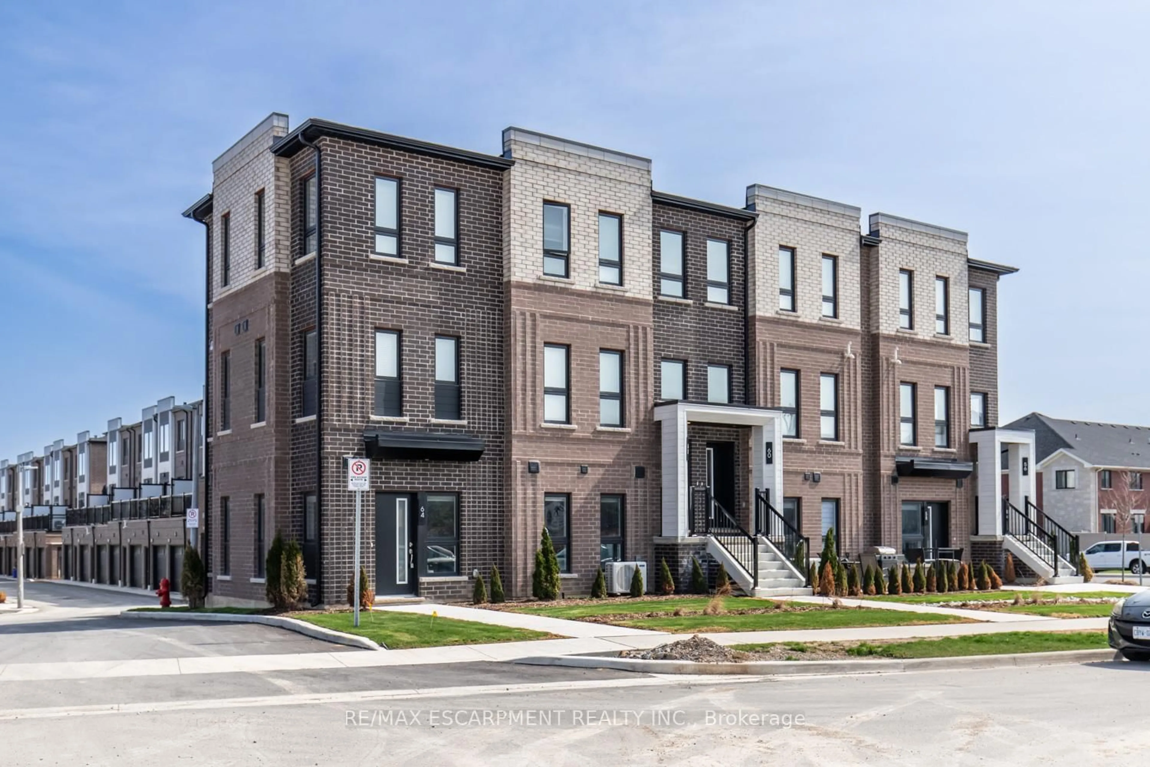 Home with brick exterior material, street for 64 Kenesky Dr, Hamilton Ontario L8B 2A9