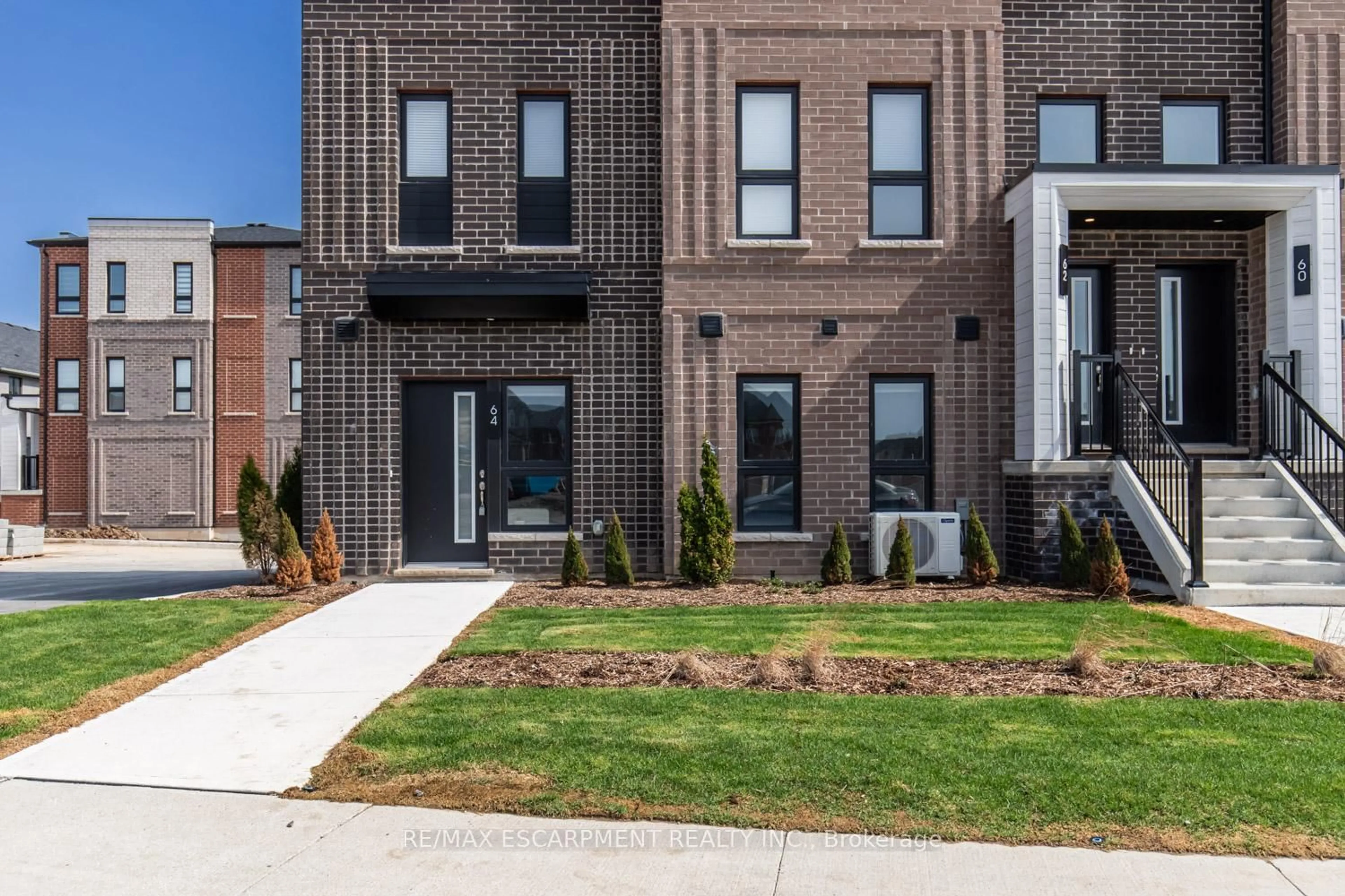 Home with brick exterior material, street for 64 Kenesky Dr, Hamilton Ontario L8B 2A9