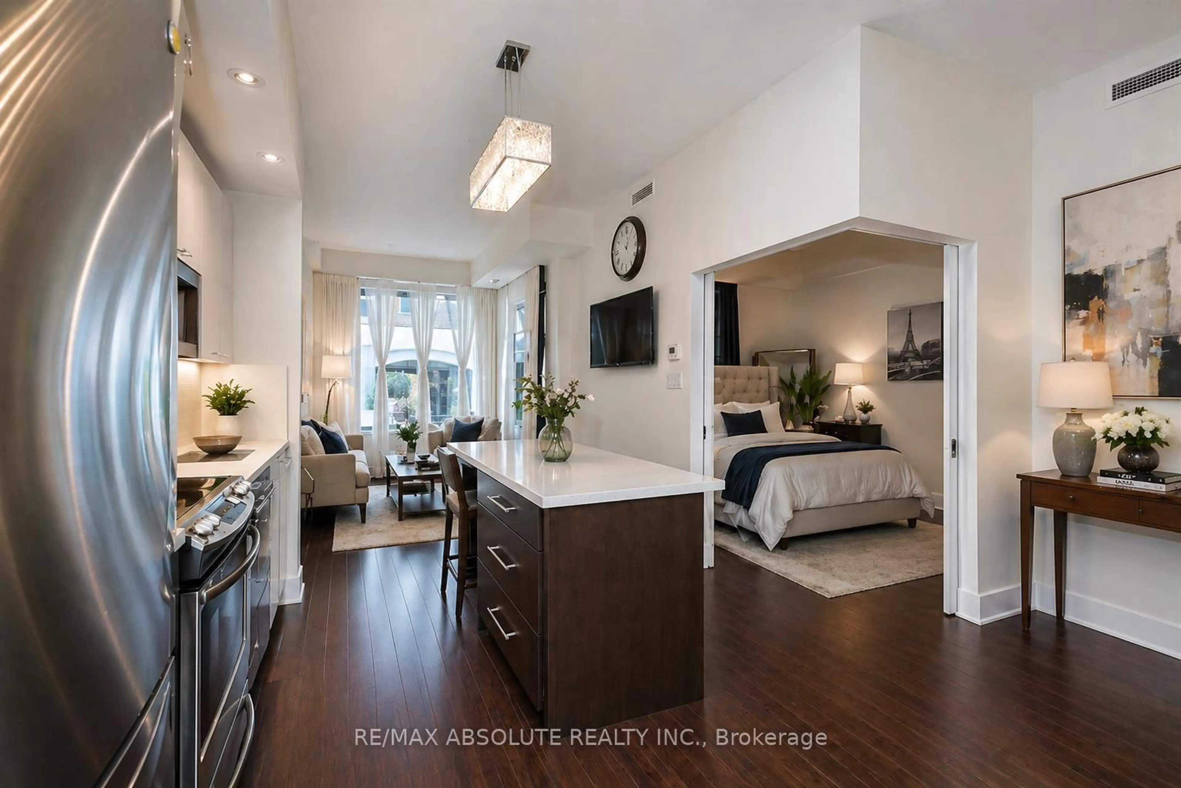 Open concept kitchen, wood/laminate floor for 101 Richmond Rd #217, Ottawa Ontario K1Z 0A6