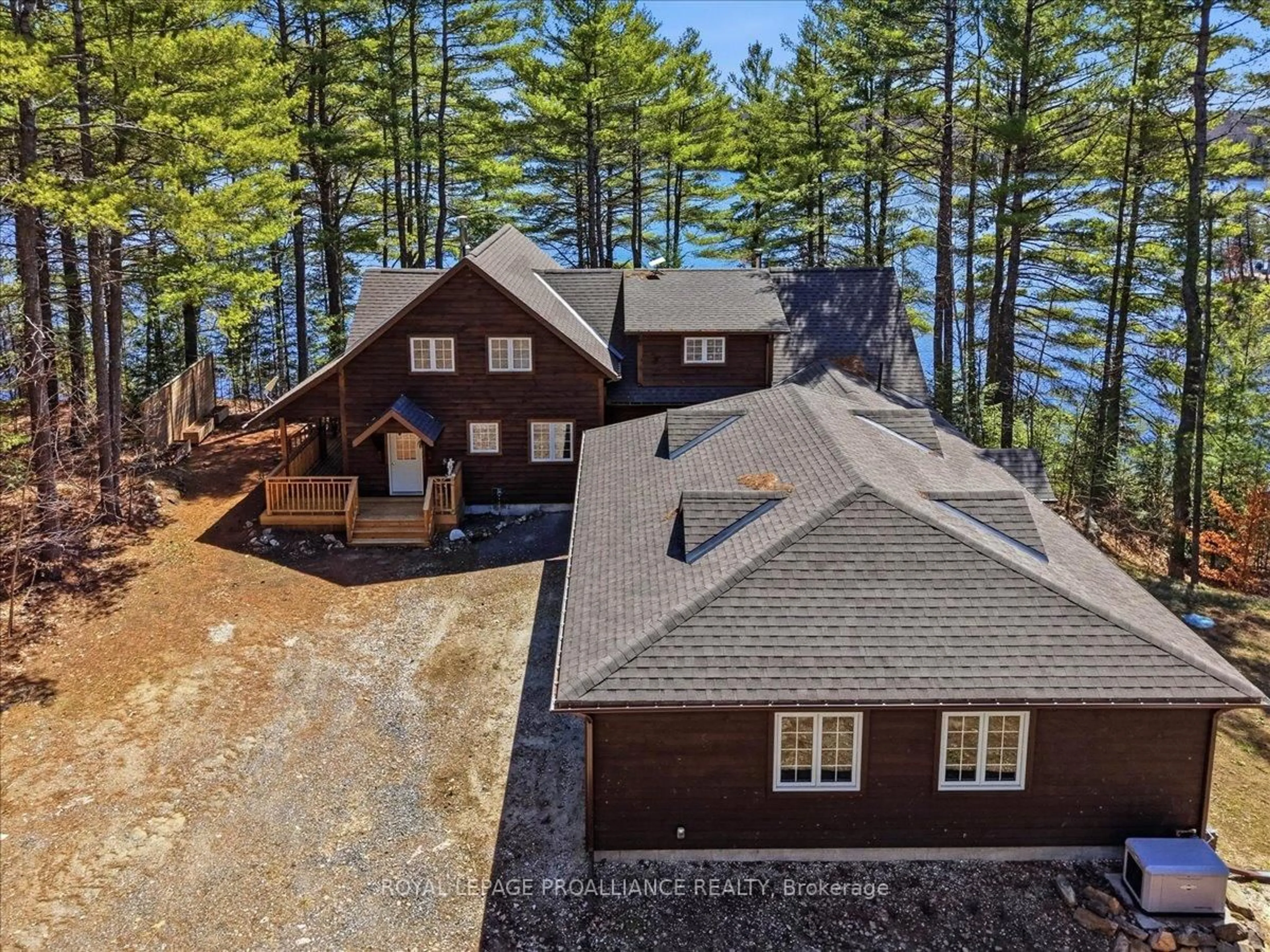 A pic from outside/outdoor area/front of a property/back of a property/a pic from drone, water/lake/river/ocean view for 1421 Turtle Lake Lane, Plevna Ontario K0H 2M0