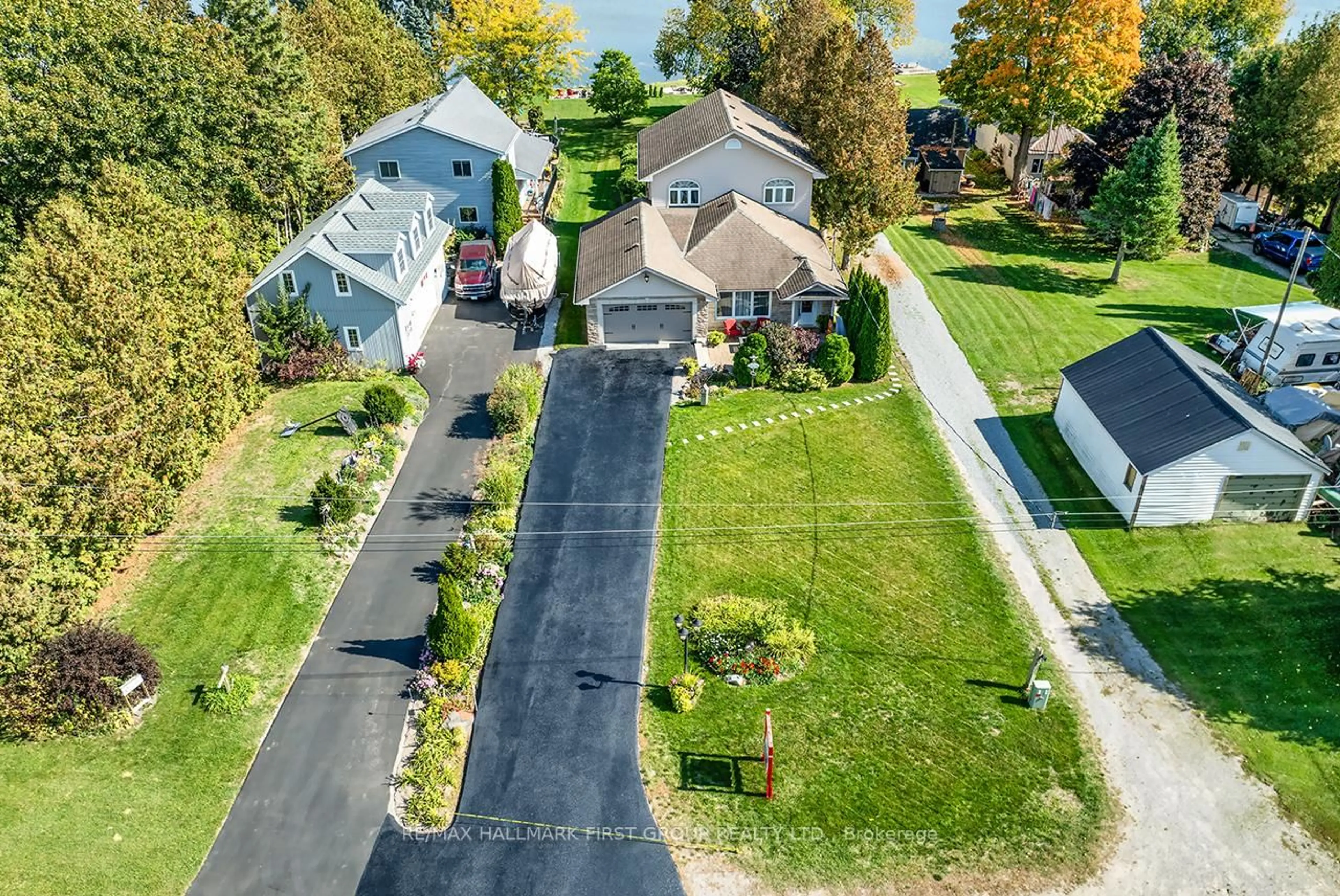 A pic from outside/outdoor area/front of a property/back of a property/a pic from drone, street for 61 Druan Dr, Kawartha Lakes Ontario L0C 1G0