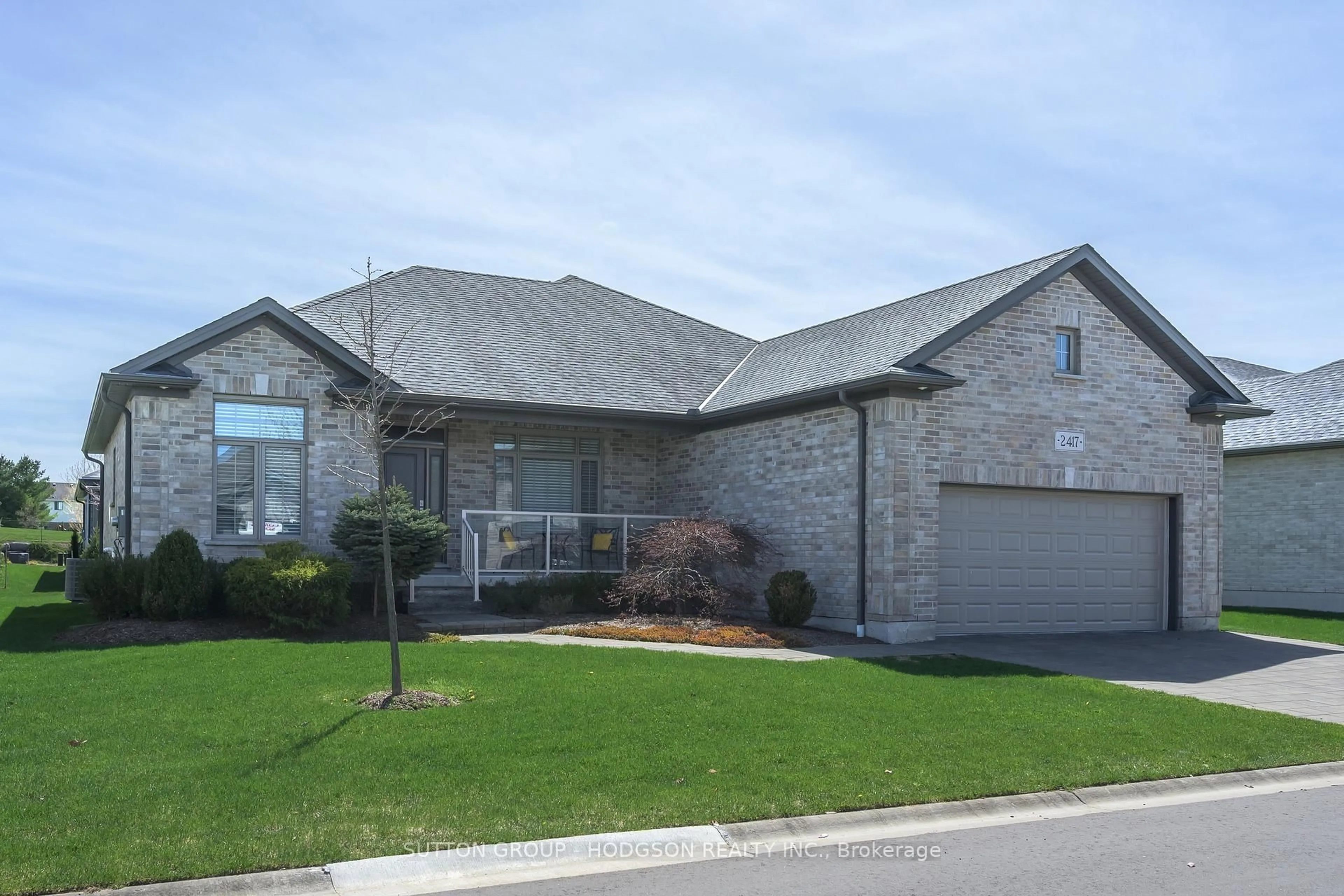 Home with brick exterior material, street for 2417 Moe Norman Way, London South Ontario N6K 5R5