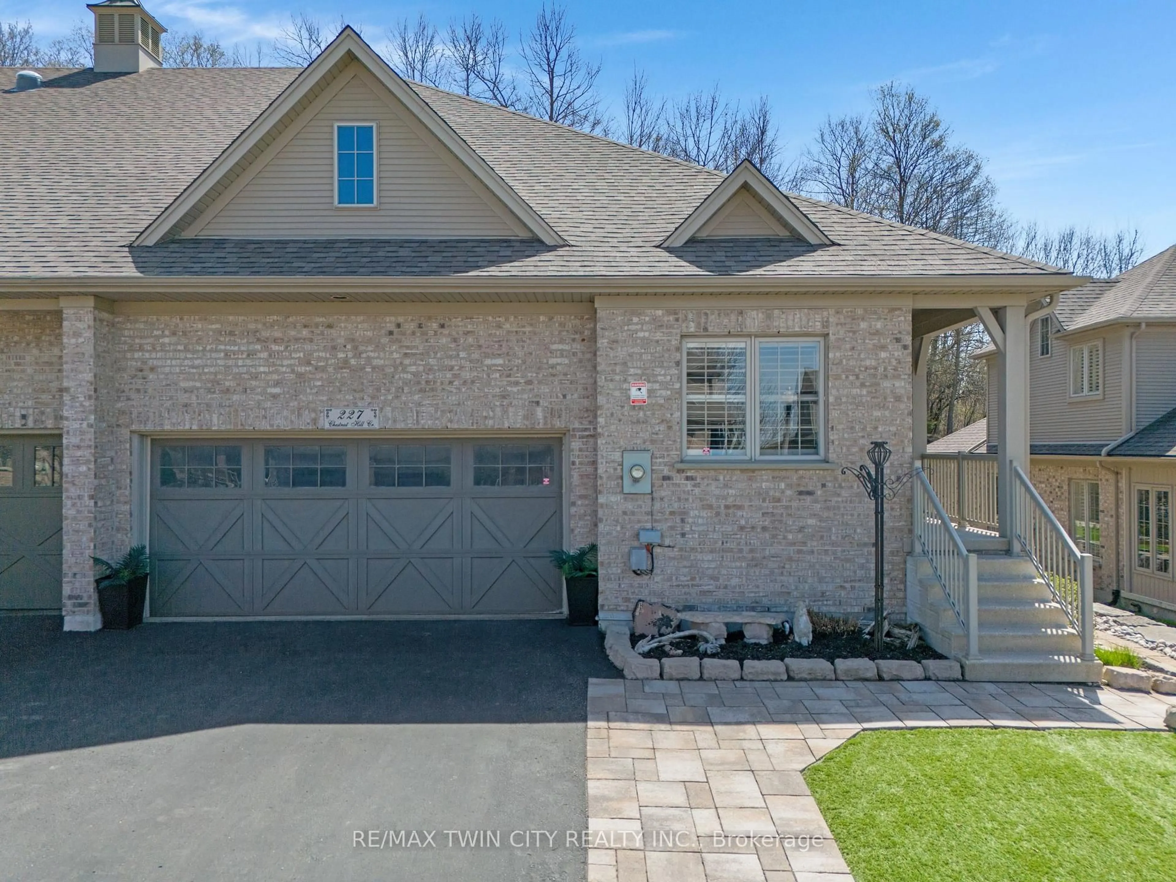 Home with brick exterior material, street for 227 Chestnut Hill Cres, Kitchener Ontario N2P 2X3