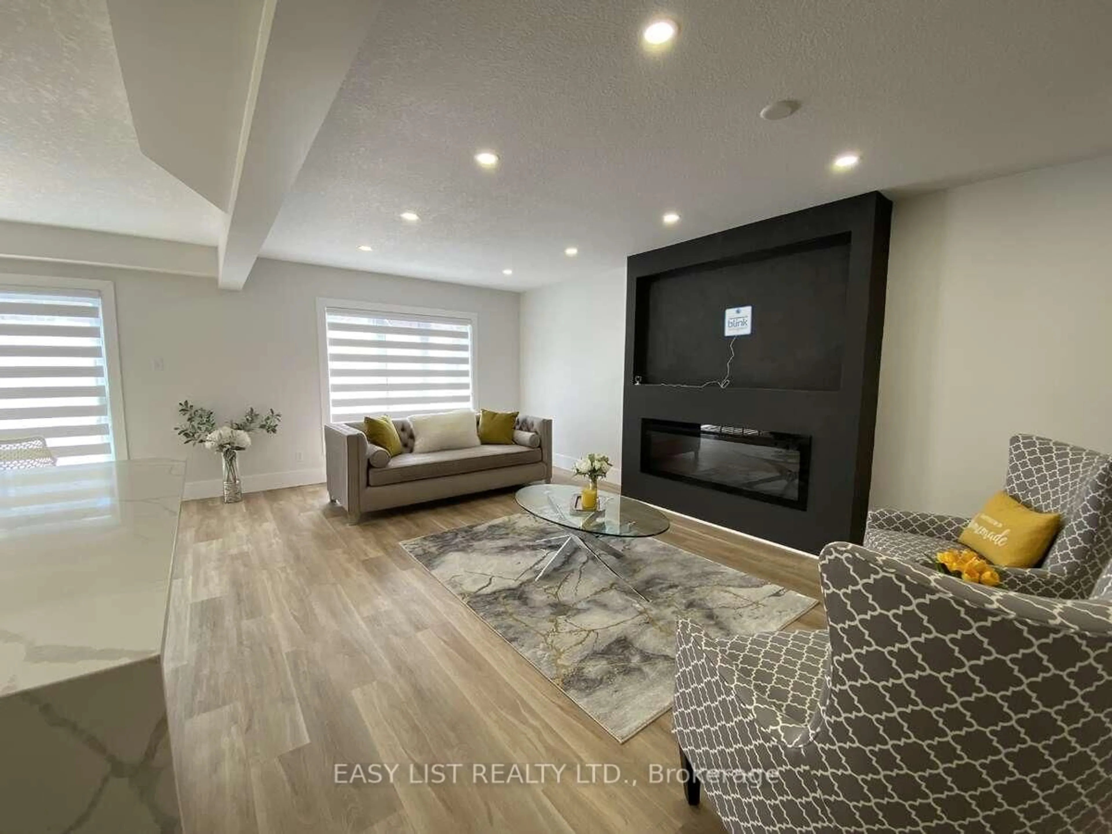 Living room with furniture, unknown for 125 Steepleridge St, Kitchener Ontario N2P 2W2