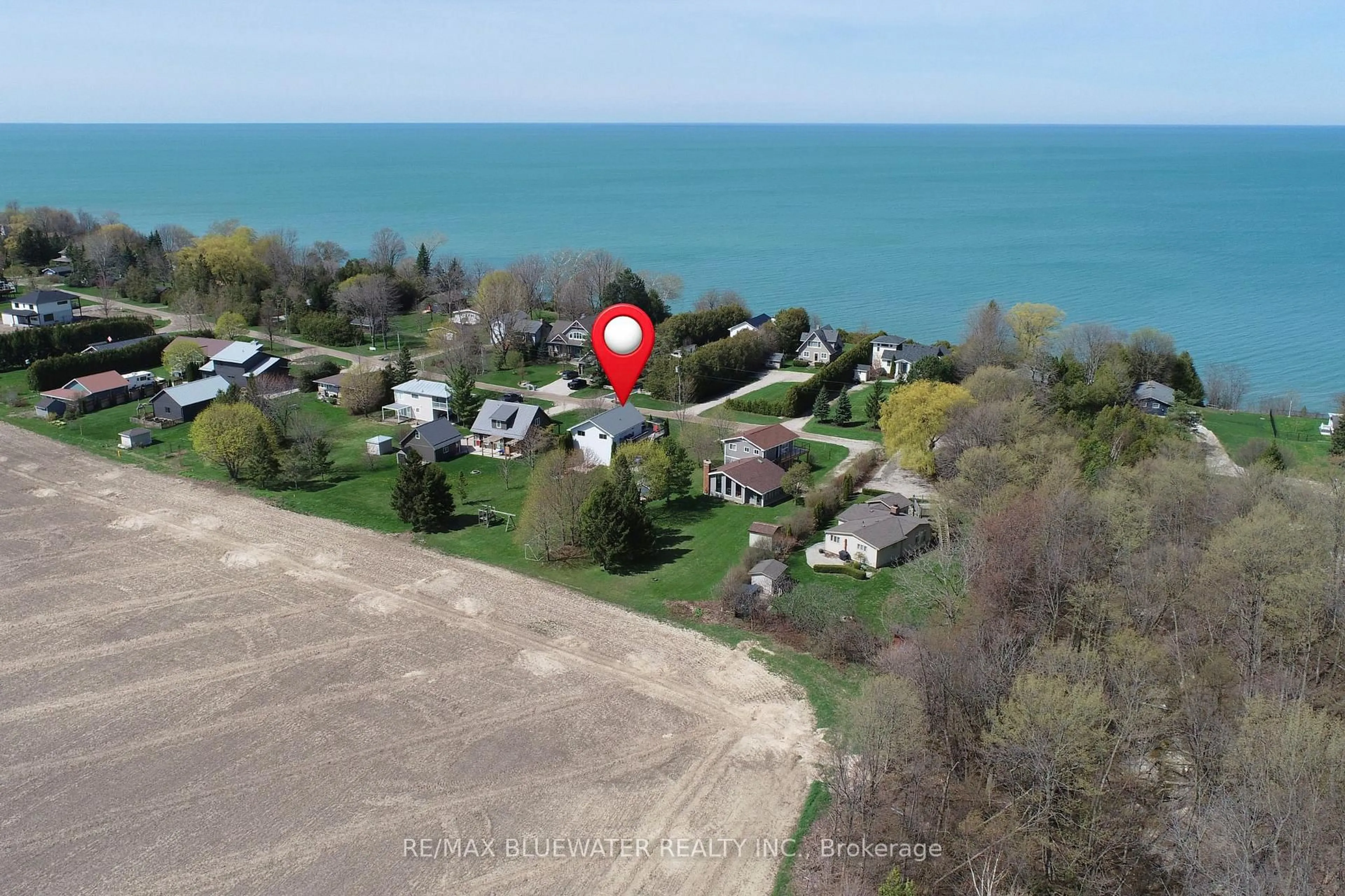 A pic from outside/outdoor area/front of a property/back of a property/a pic from drone, water/lake/river/ocean view for 74156 Bluehaven Beach Dr, Bluewater Ontario N0M 2T0