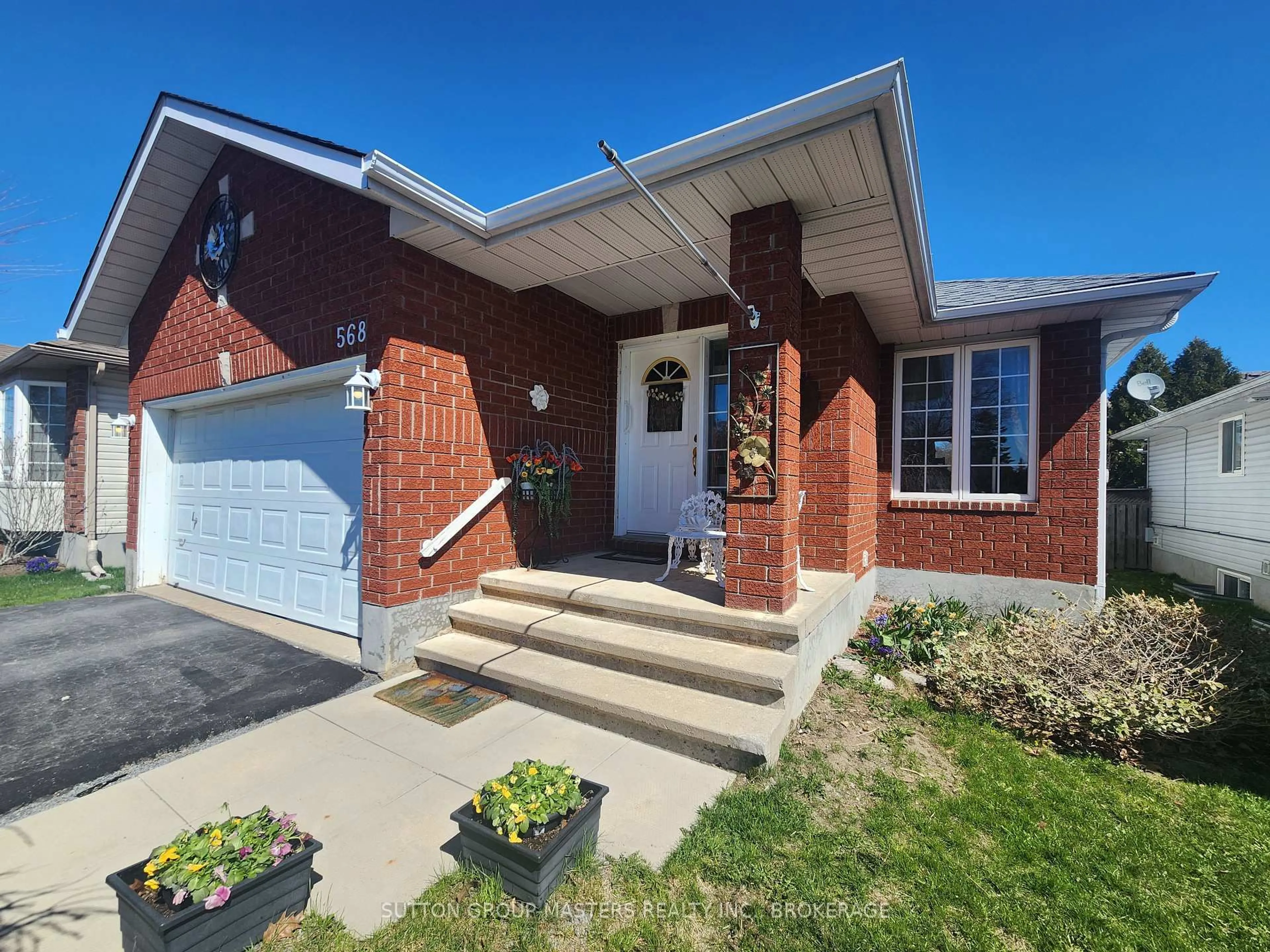 Home with brick exterior material, street for 568 Roosevelt Dr, Kingston Ontario K7M 8Z7