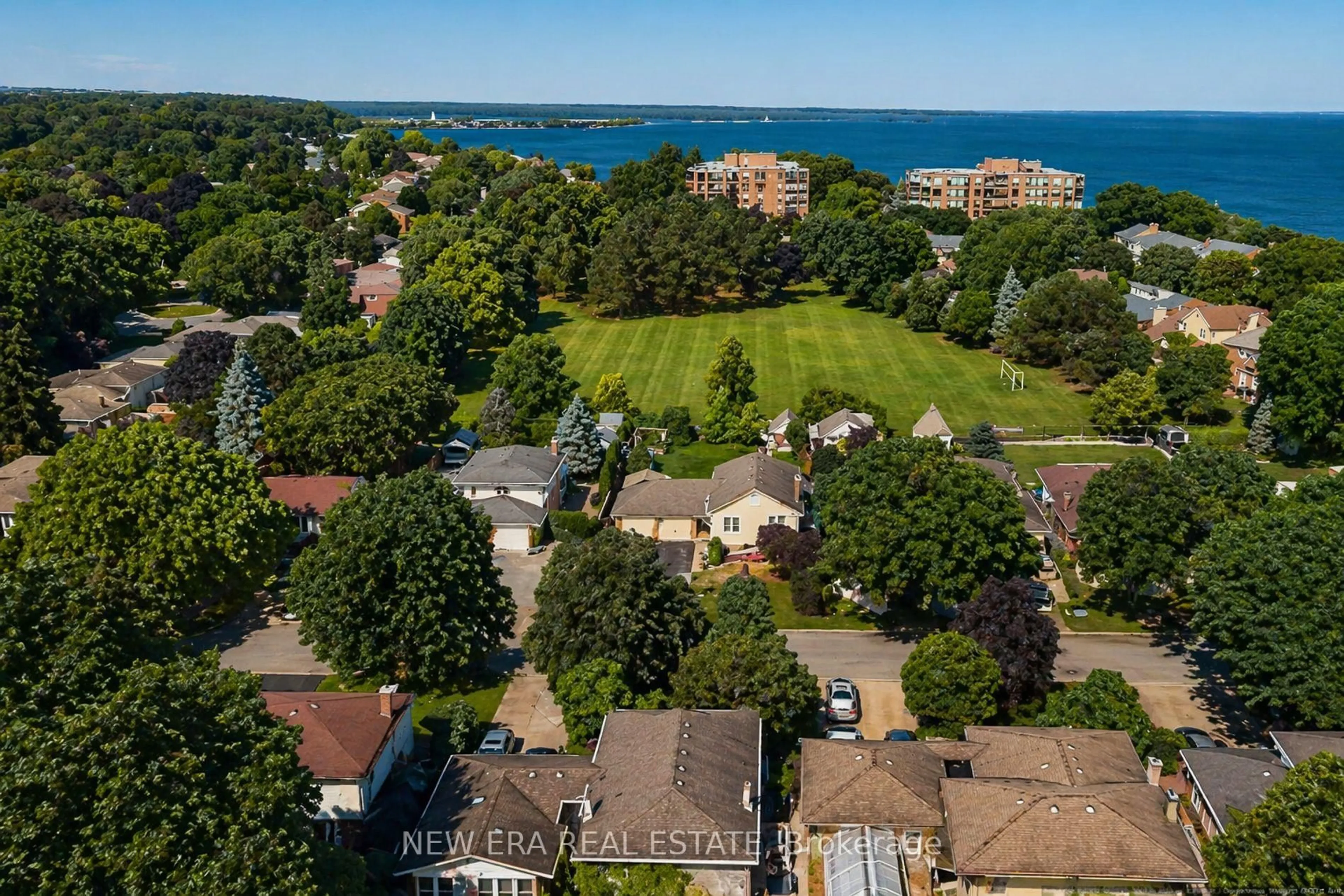 A pic from outside/outdoor area/front of a property/back of a property/a pic from drone, water/lake/river/ocean view for 55 Spring Garden Blvd, St. Catharines Ontario L2N 3R2