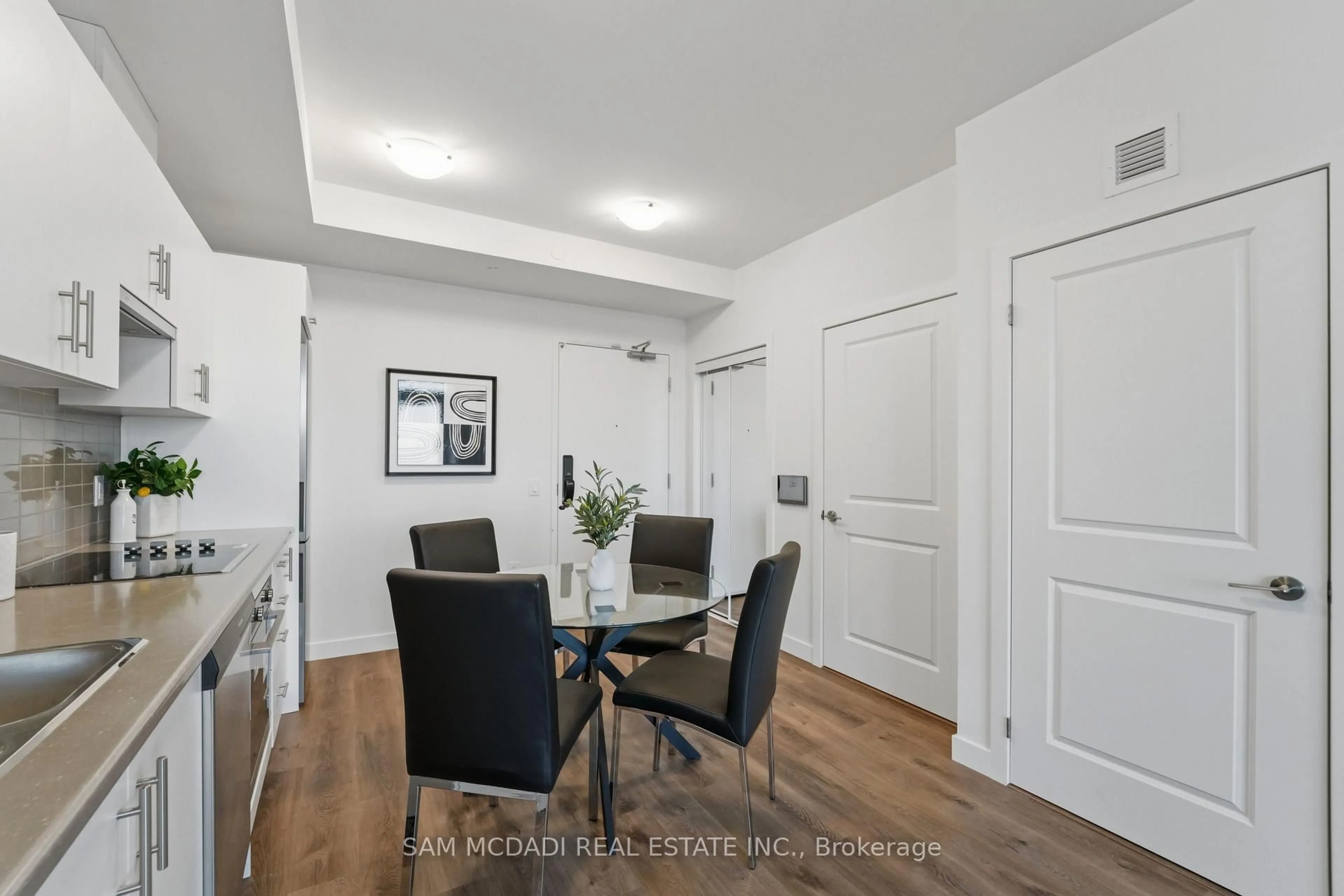 Dining room, wood/laminate floor for 461 Green Rd #1012, Hamilton Ontario L8E 5B4