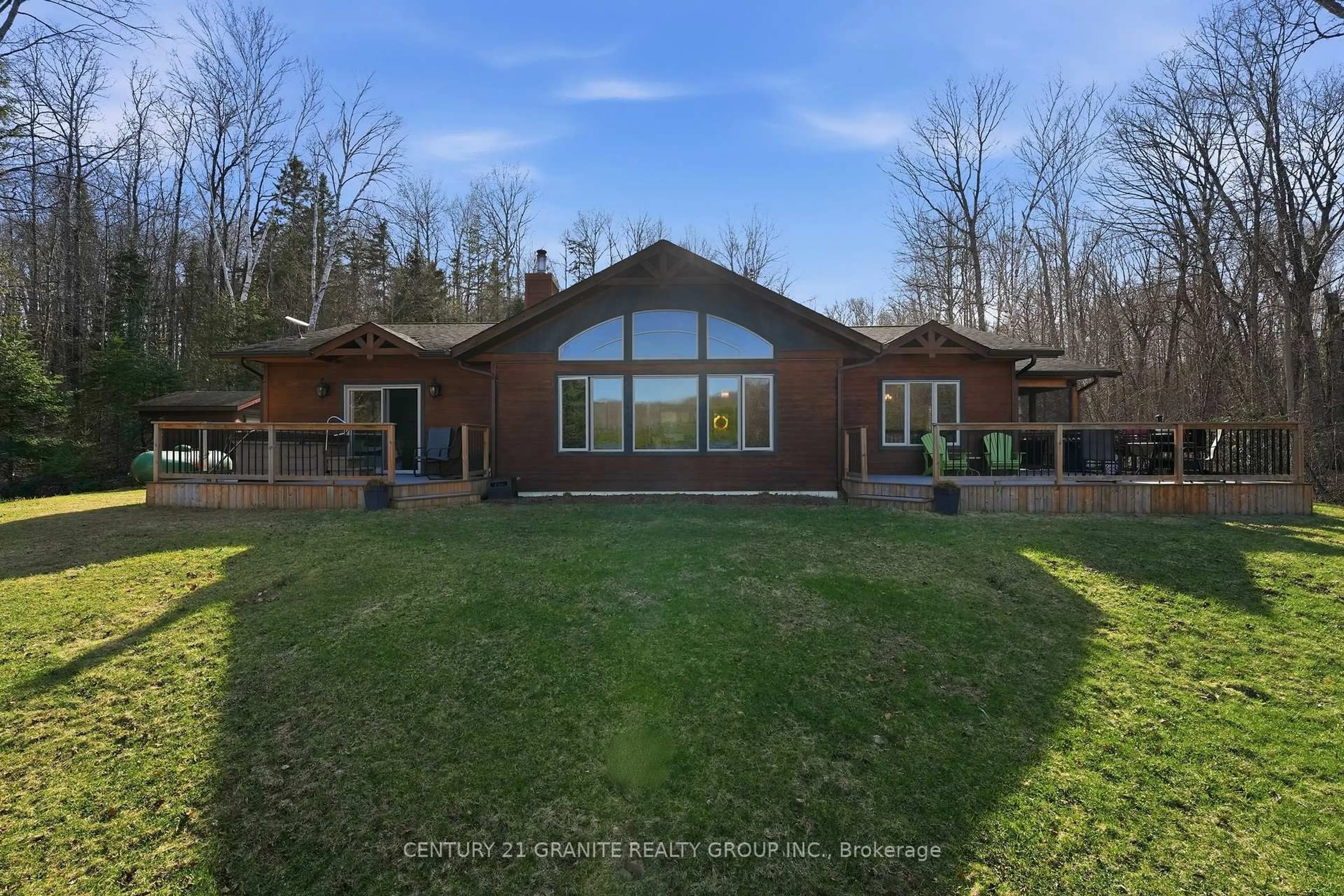 A pic from outside/outdoor area/front of a property/back of a property/a pic from drone, water/lake/river/ocean view for 89 Vader Lake Rd, Coe Hill Ontario K0L 1P0