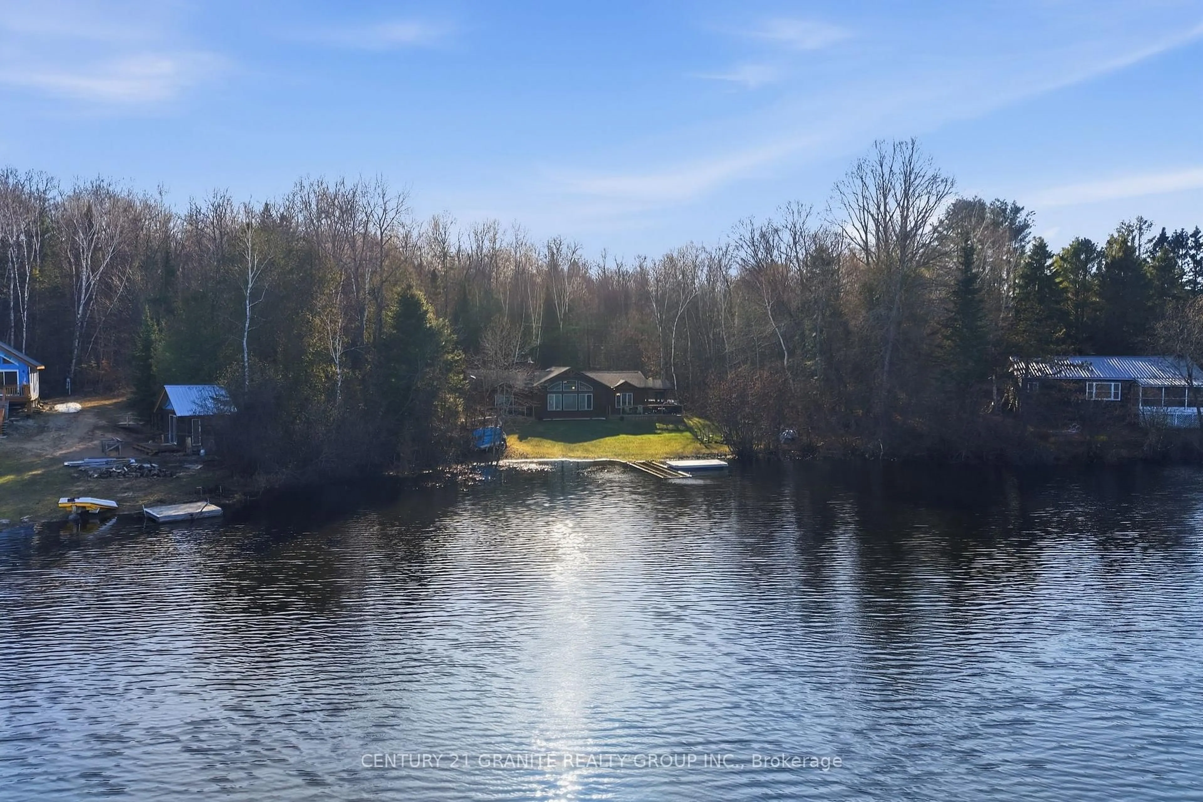 A pic from outside/outdoor area/front of a property/back of a property/a pic from drone, water/lake/river/ocean view for 89 Vader Lake Rd, Coe Hill Ontario K0L 1P0