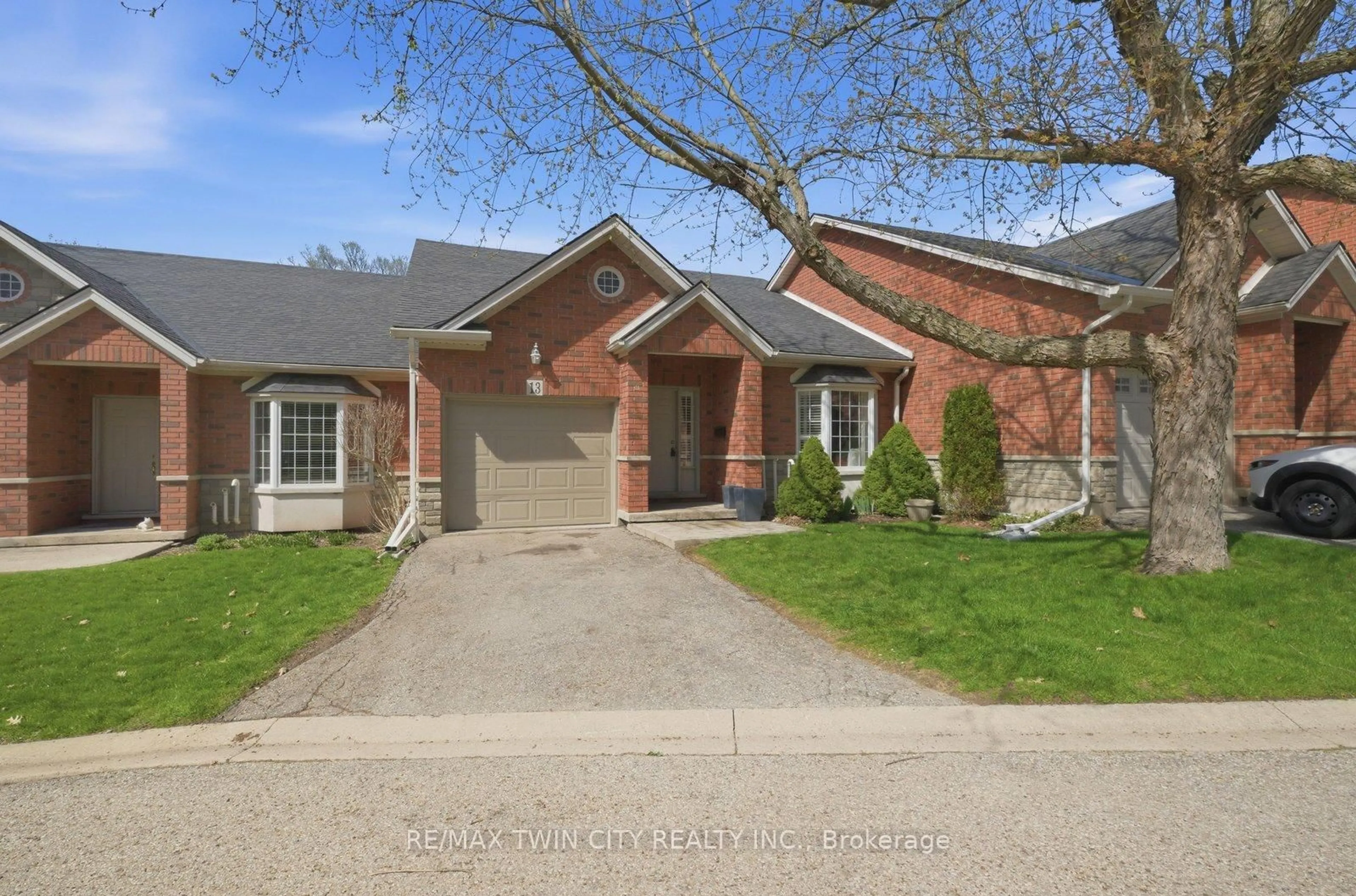 Home with brick exterior material, street for 24 Hardy Rd #13, Brantford Ontario N3T 5K6