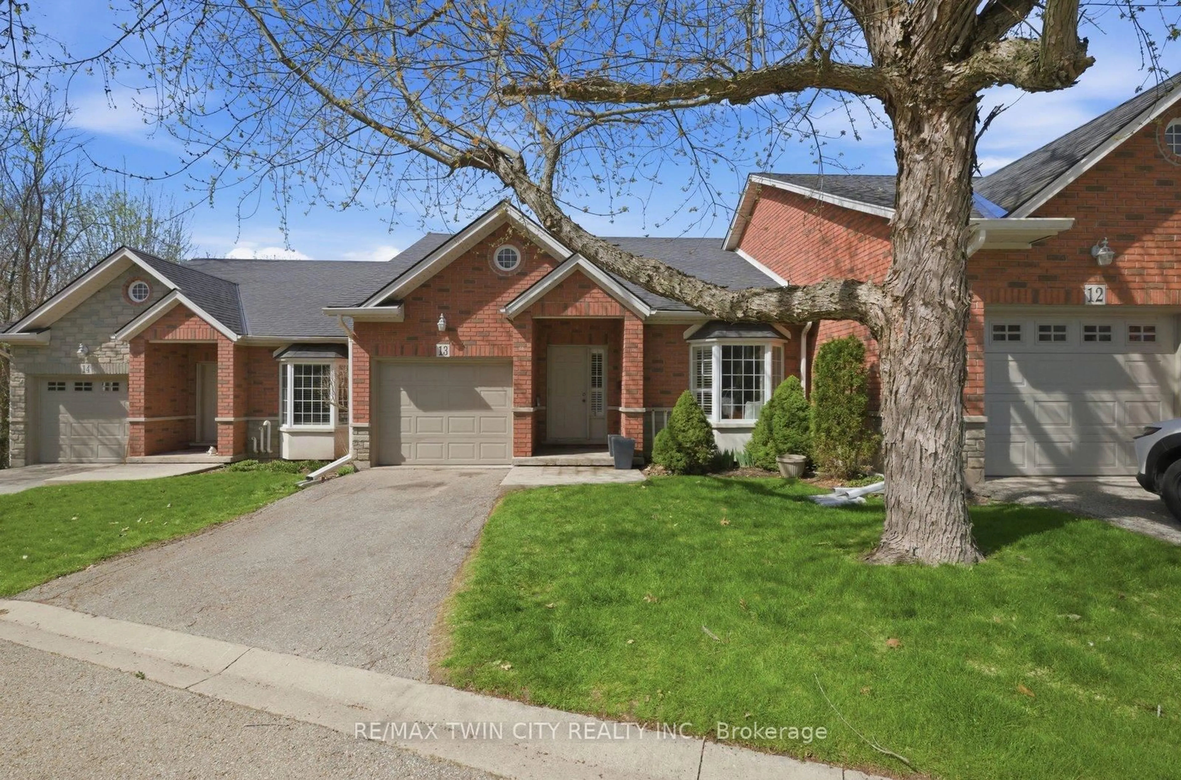 Home with brick exterior material, street for 24 Hardy Rd #13, Brantford Ontario N3T 5K6