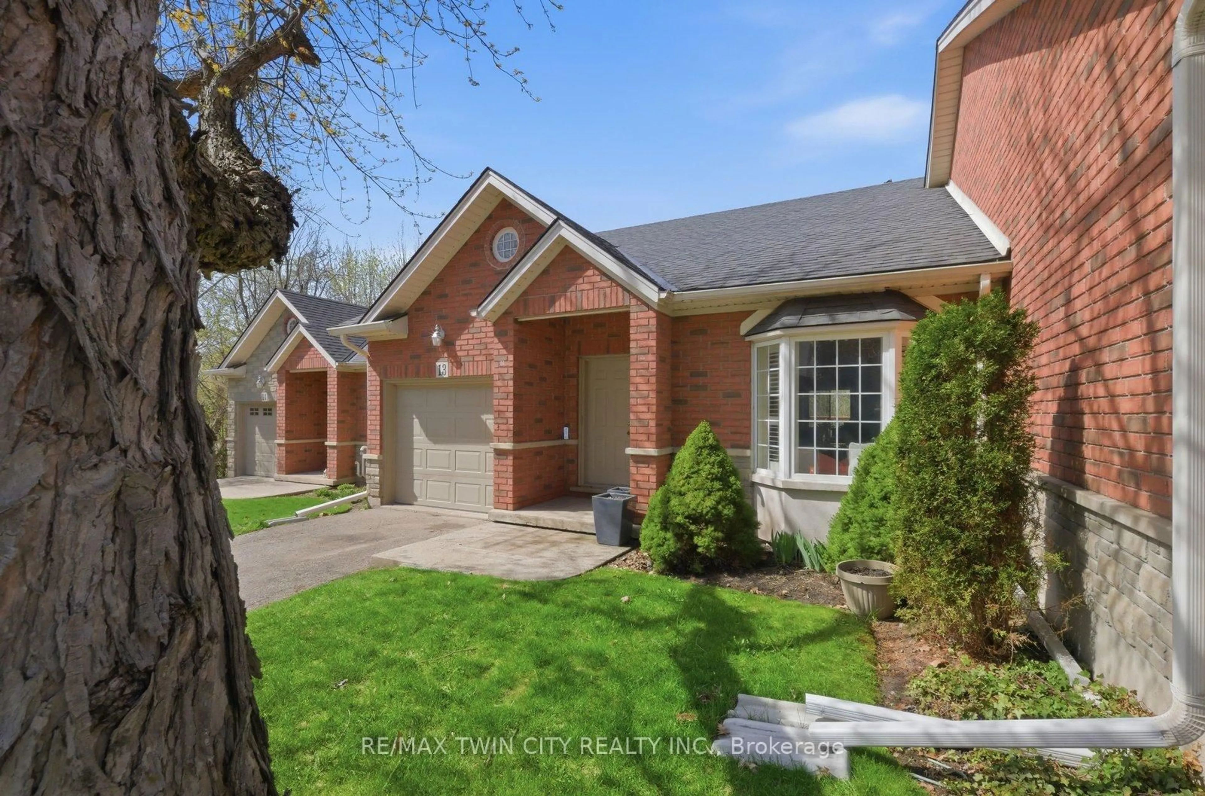 Home with brick exterior material, street for 24 Hardy Rd #13, Brantford Ontario N3T 5K6