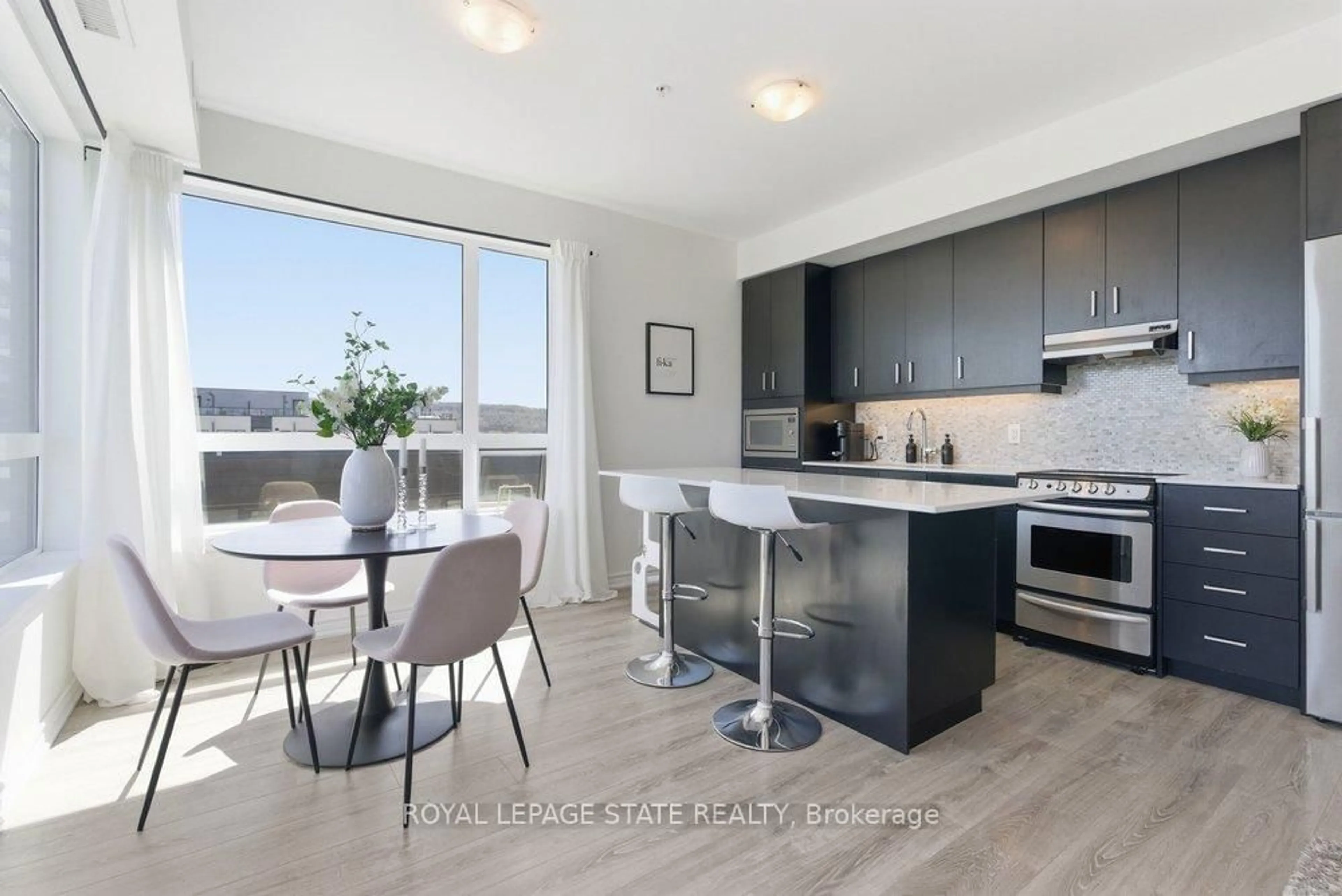 Open concept kitchen, unknown for 40 Esplanade Lane #406, Grimsby Ontario L3M 0G9