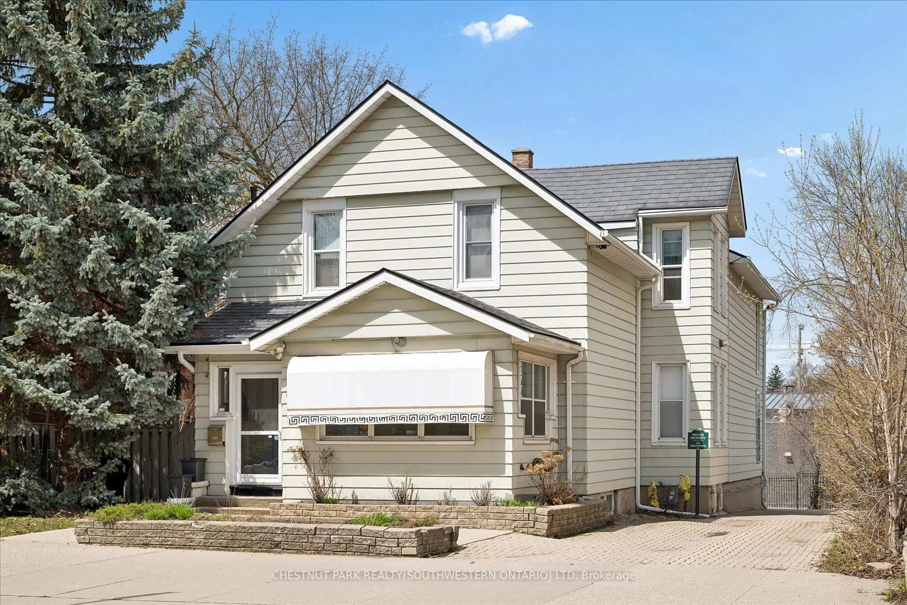 Home with vinyl exterior material, street for 64 Francis St, Kitchener Ontario N2H 5B5