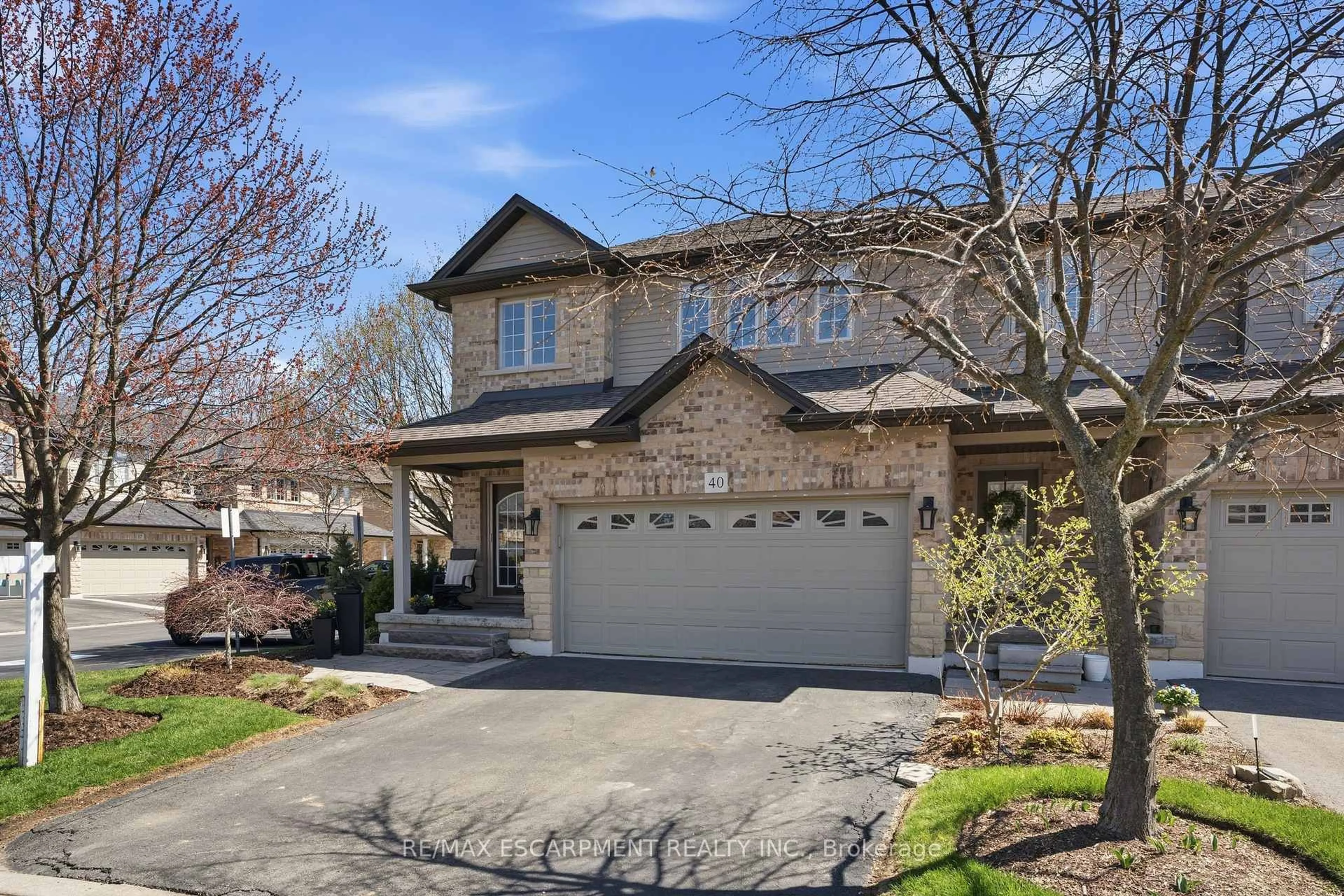 Home with brick exterior material, street for 441 STONEHENGE Dr #40, Hamilton Ontario L9K 0B1