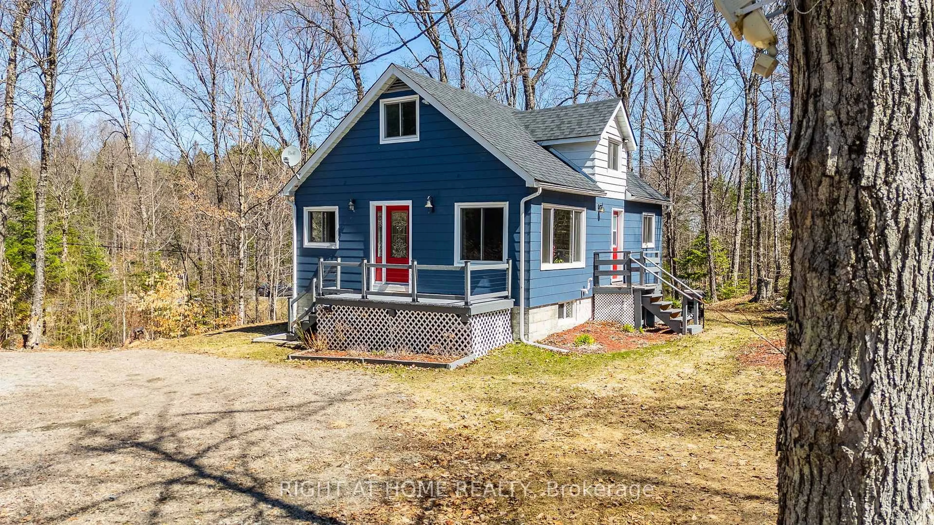 A pic from outside/outdoor area/front of a property/back of a property/a pic from drone, street for 1066 Loop Rd, Highlands East Ontario K0L 1C0