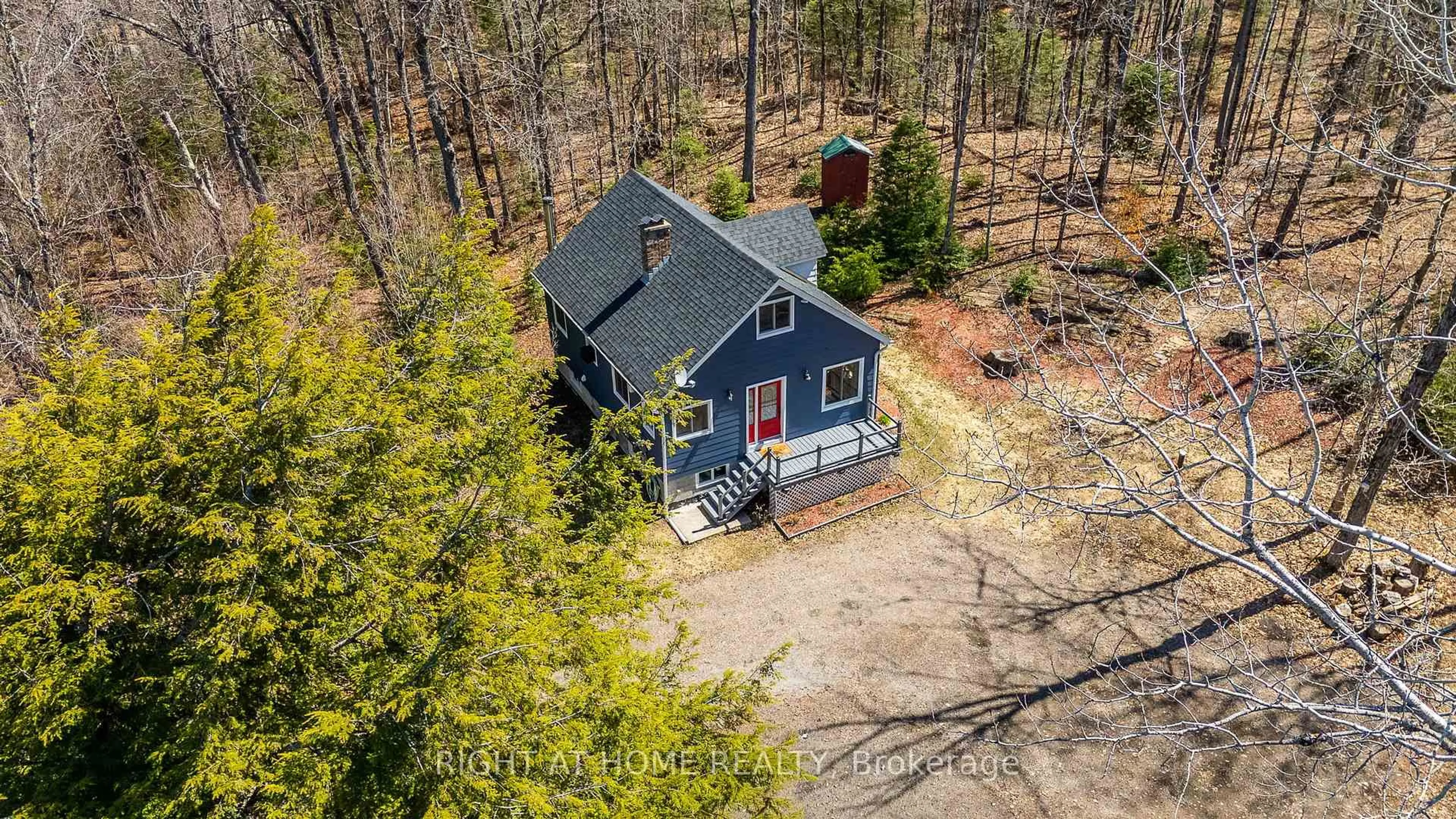 A pic from outside/outdoor area/front of a property/back of a property/a pic from drone, forest/trees view for 1066 Loop Rd, Highlands East Ontario K0L 1C0