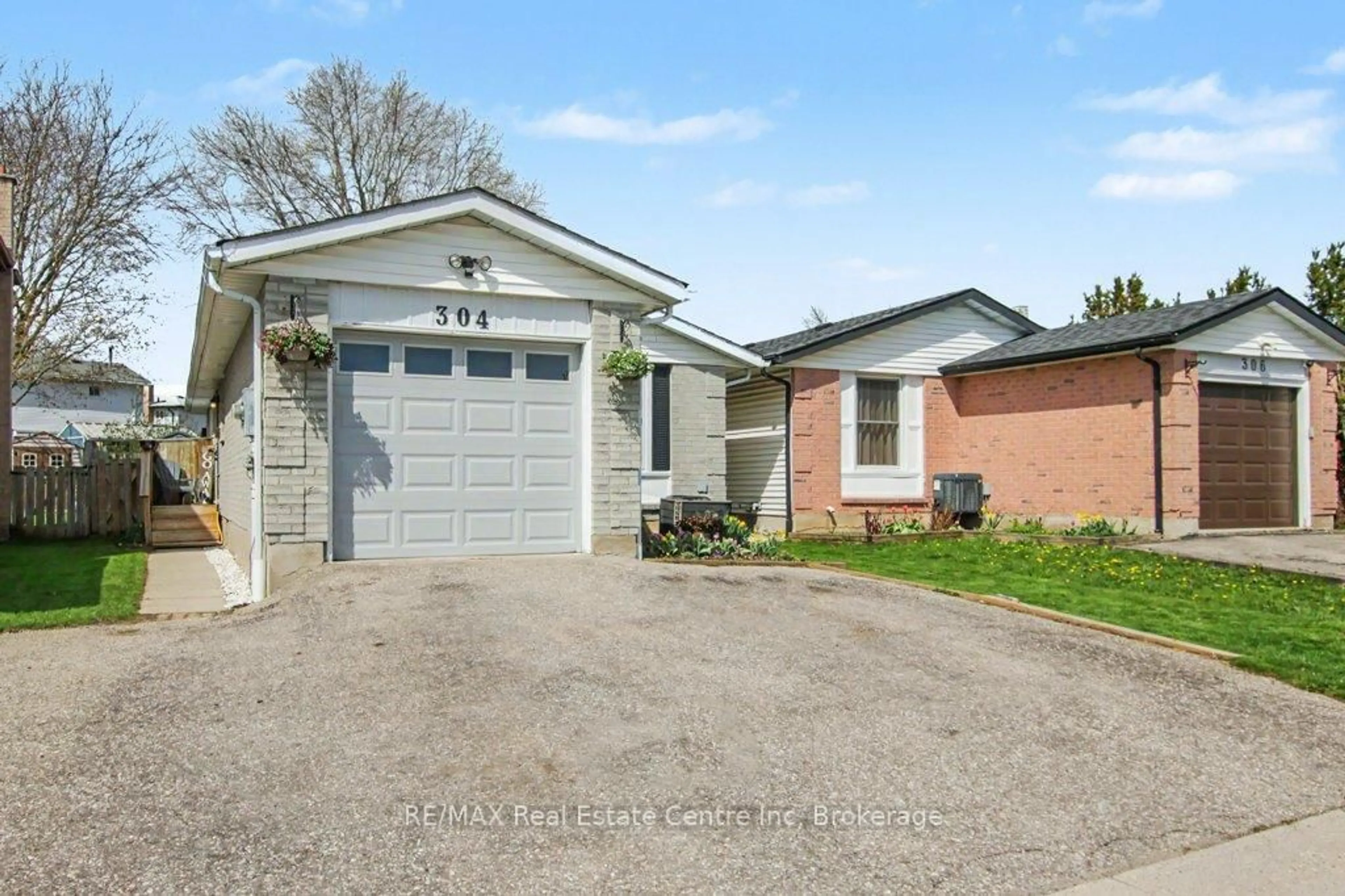 Home with brick exterior material, street for 304 Auden Rd, Guelph Ontario N1E 6S3