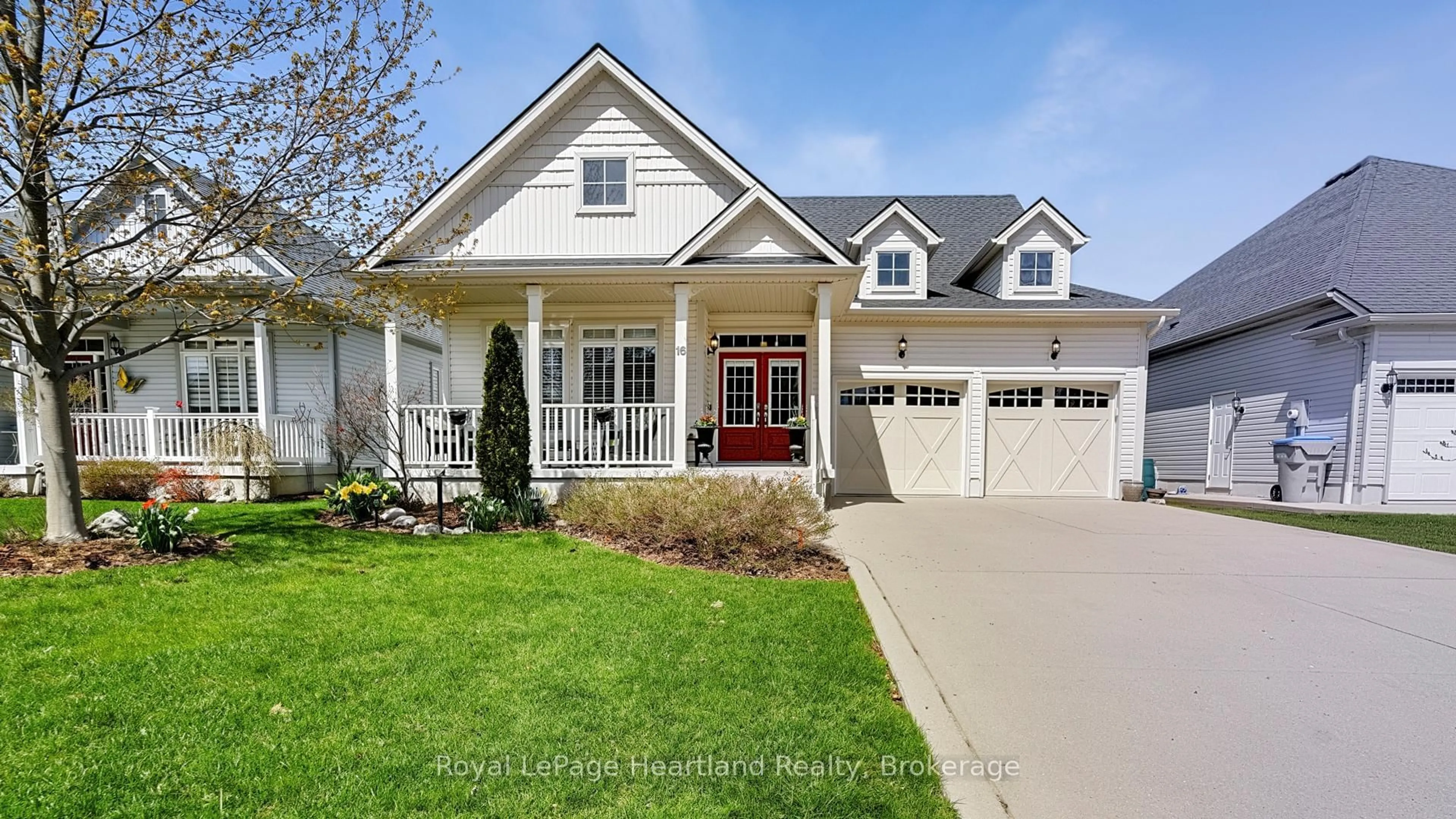 Home with vinyl exterior material, street for 16 Macpherson Ave, Huron East Ontario N0K 1W0