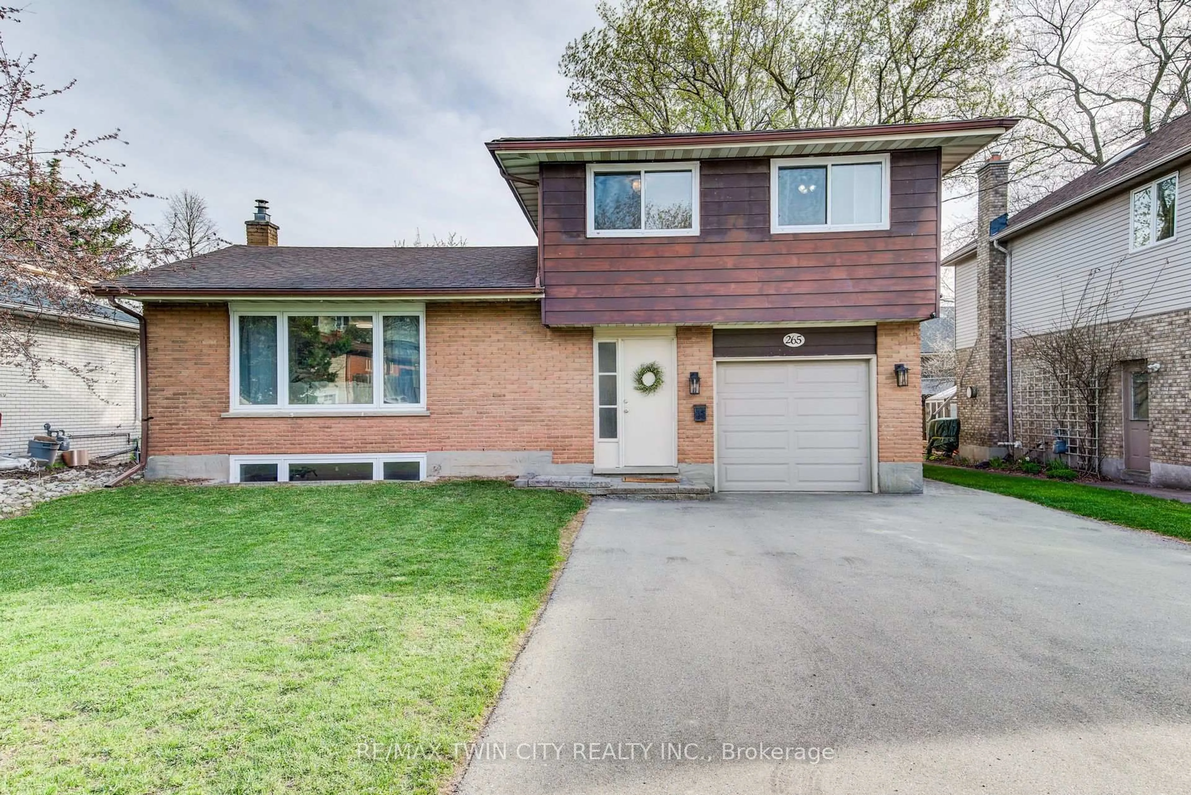 Home with brick exterior material, street for 265 Thaler Ave, Kitchener Ontario N2A 1R7