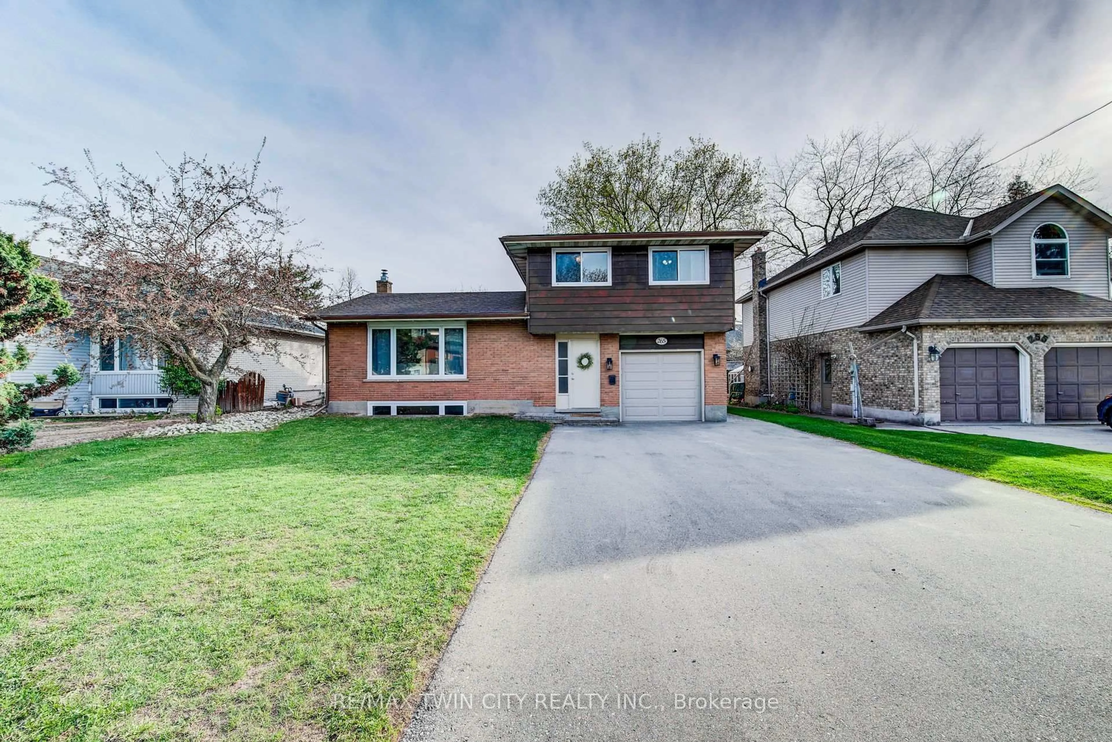 Home with brick exterior material, street for 265 Thaler Ave, Kitchener Ontario N2A 1R7