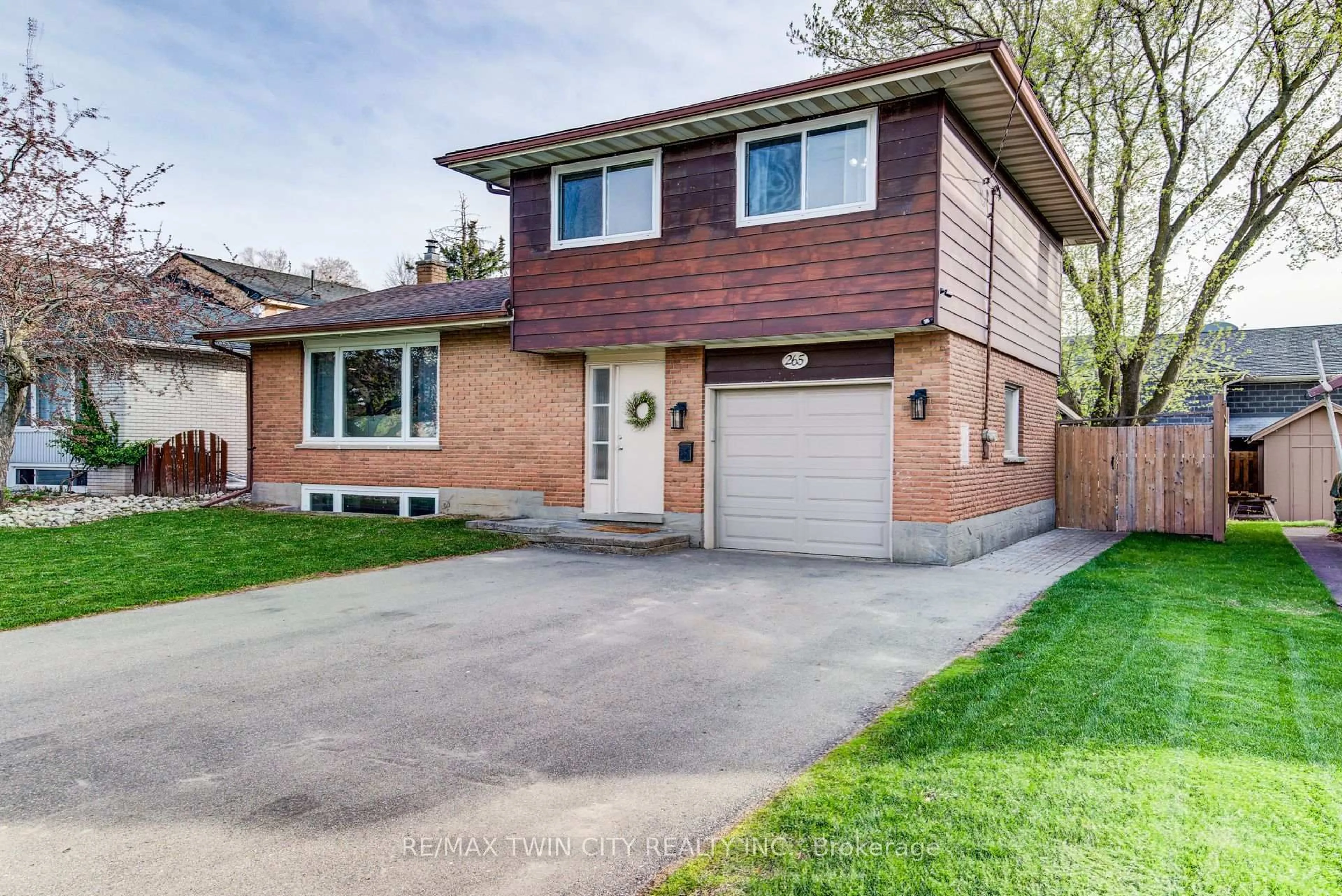 Home with brick exterior material, street for 265 Thaler Ave, Kitchener Ontario N2A 1R7