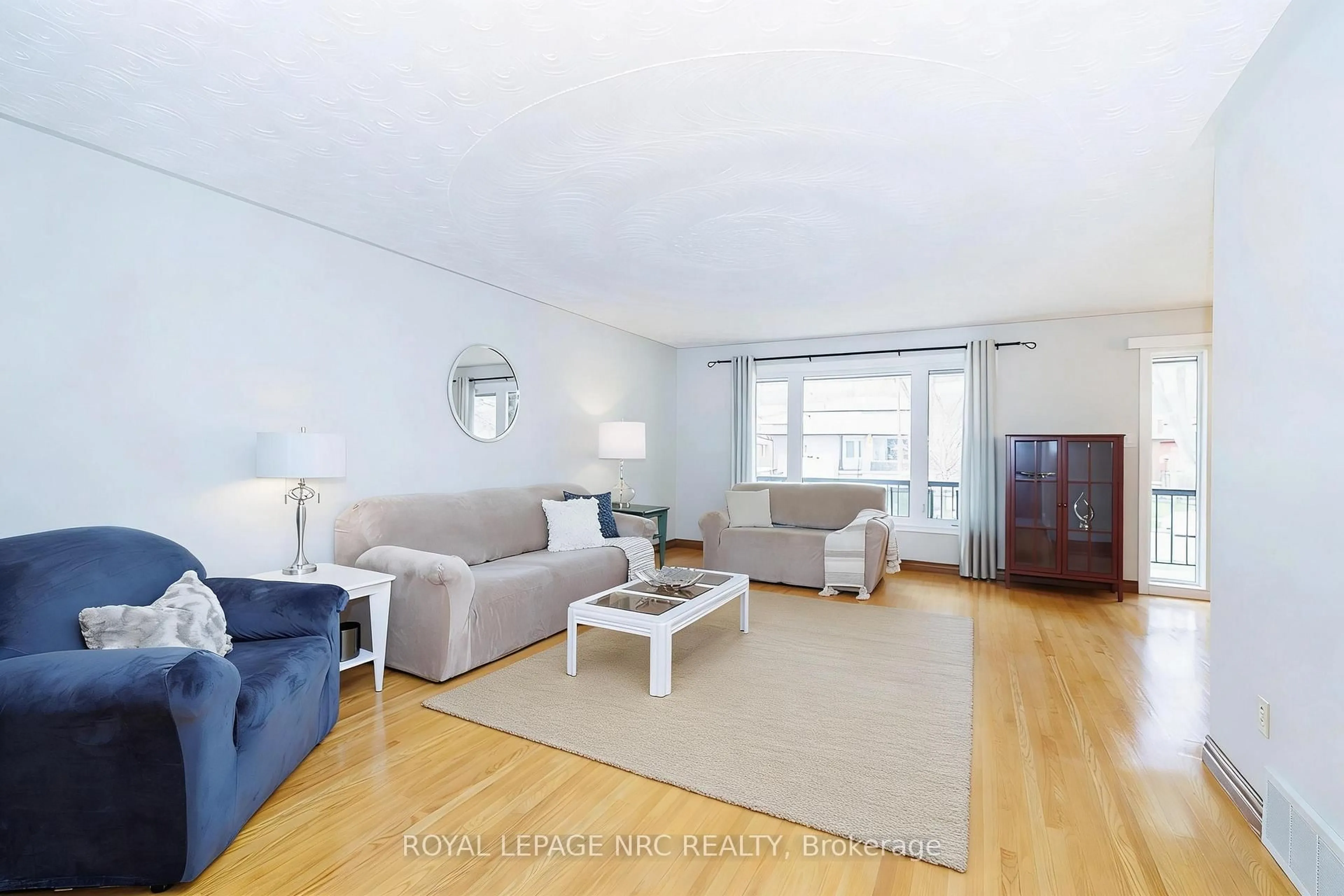 Living room with furniture, wood/laminate floor for 5 Royce Ave, Hamilton Ontario L8G 4C9