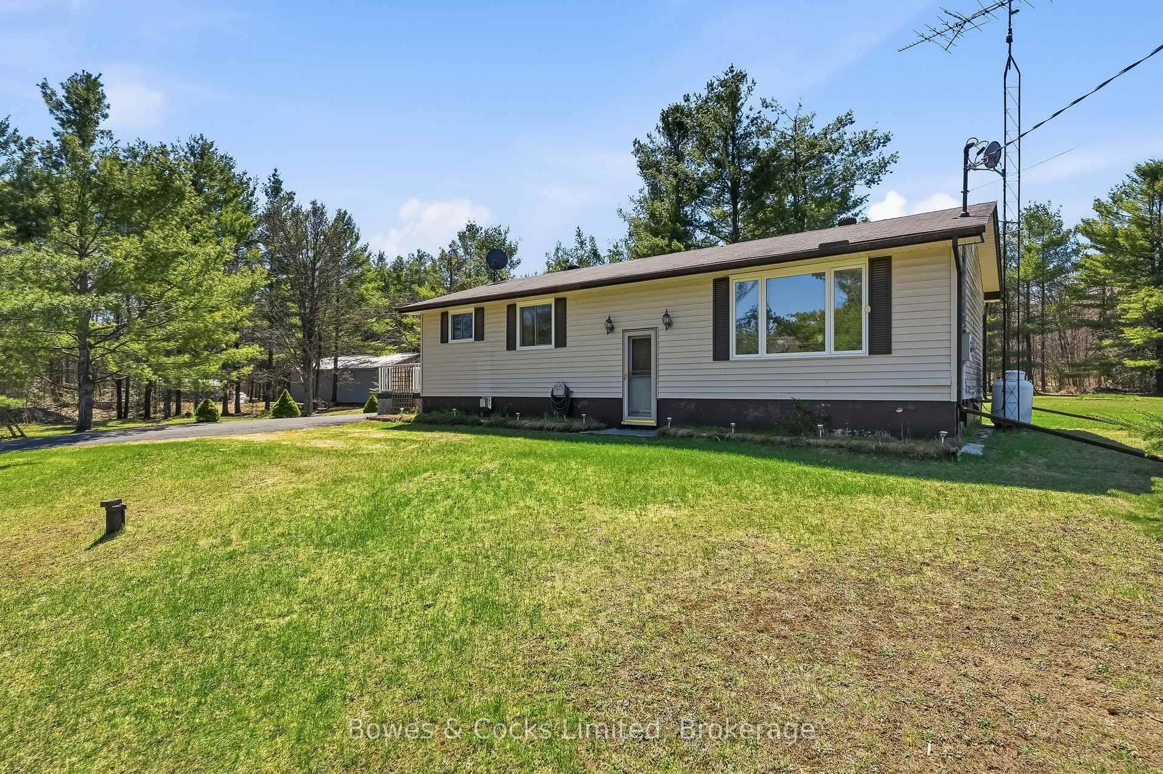 A pic from outside/outdoor area/front of a property/back of a property/a pic from drone, unknown for 1044 County Road 40, Douro-Dummer Ontario K0L 2V0