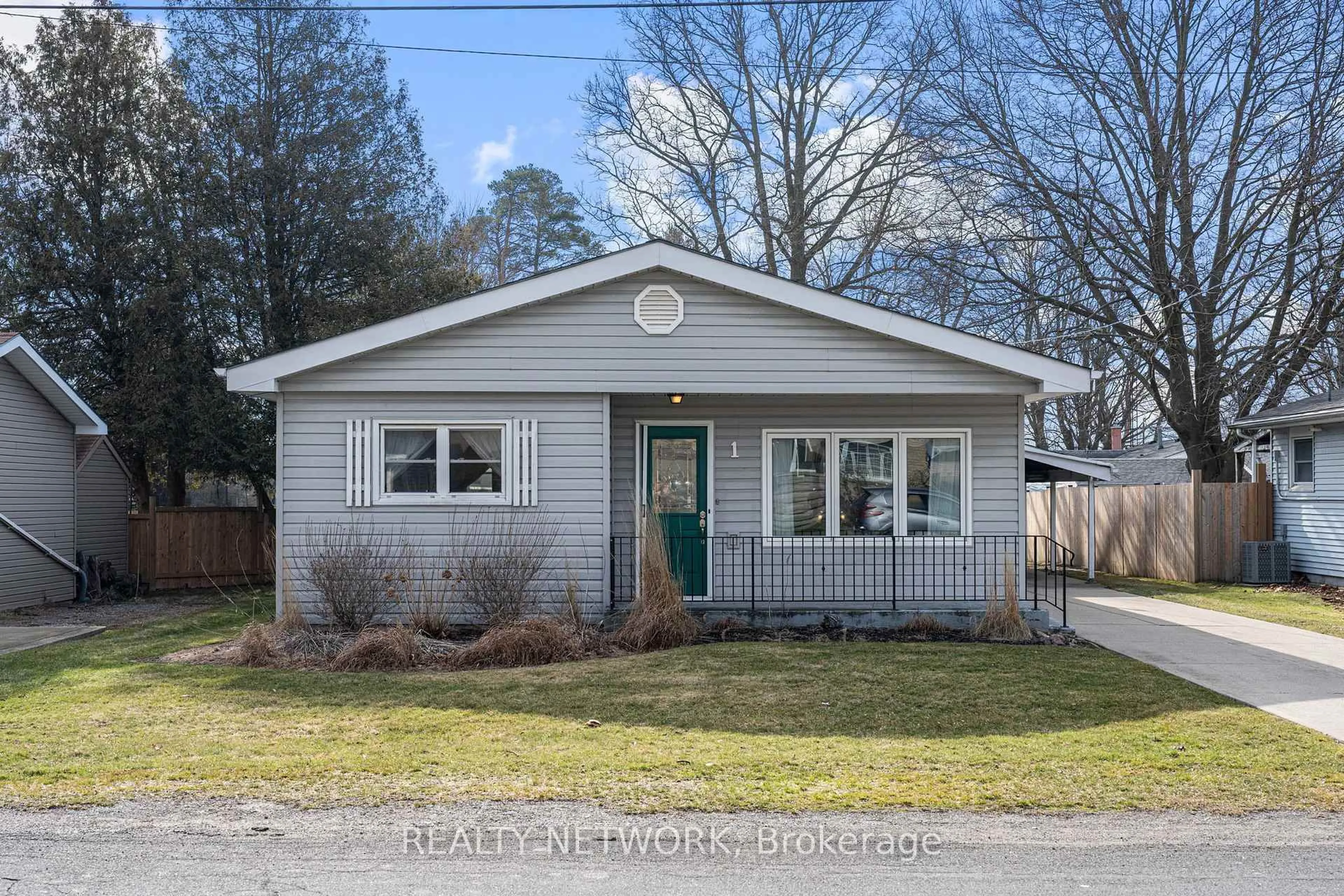 Home with vinyl exterior material, street for 1 Clifford St, Norfolk Ontario N0A 1N0