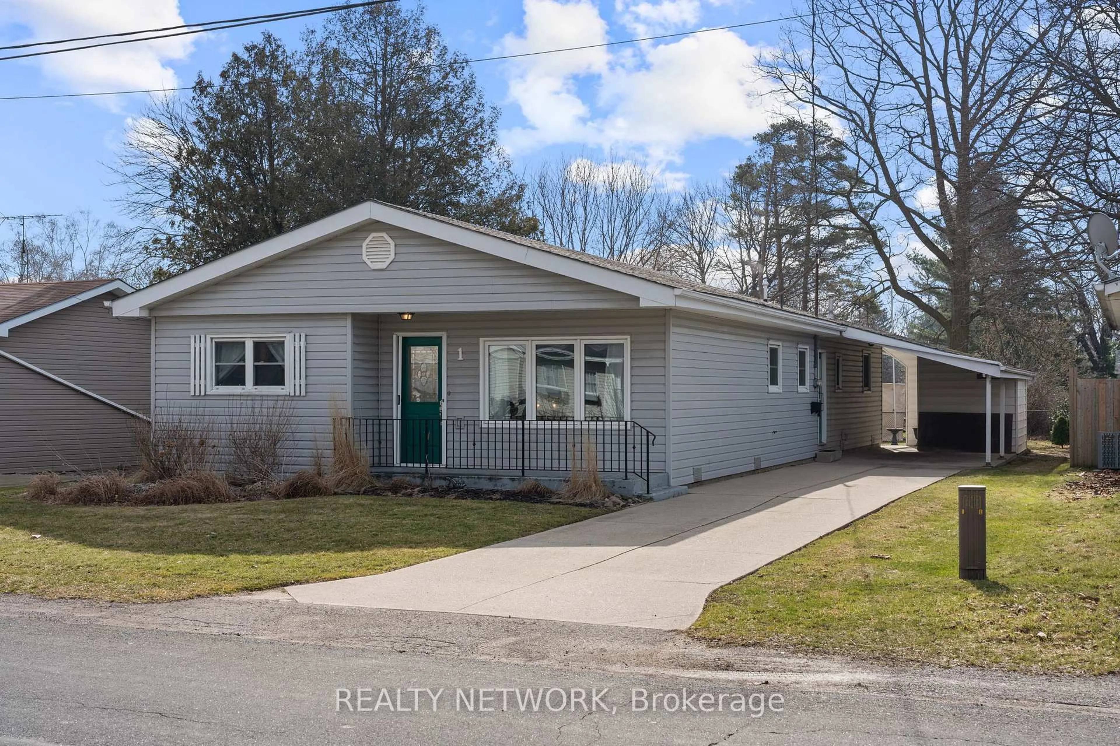 Home with vinyl exterior material, street for 1 Clifford St, Norfolk Ontario N0A 1N0