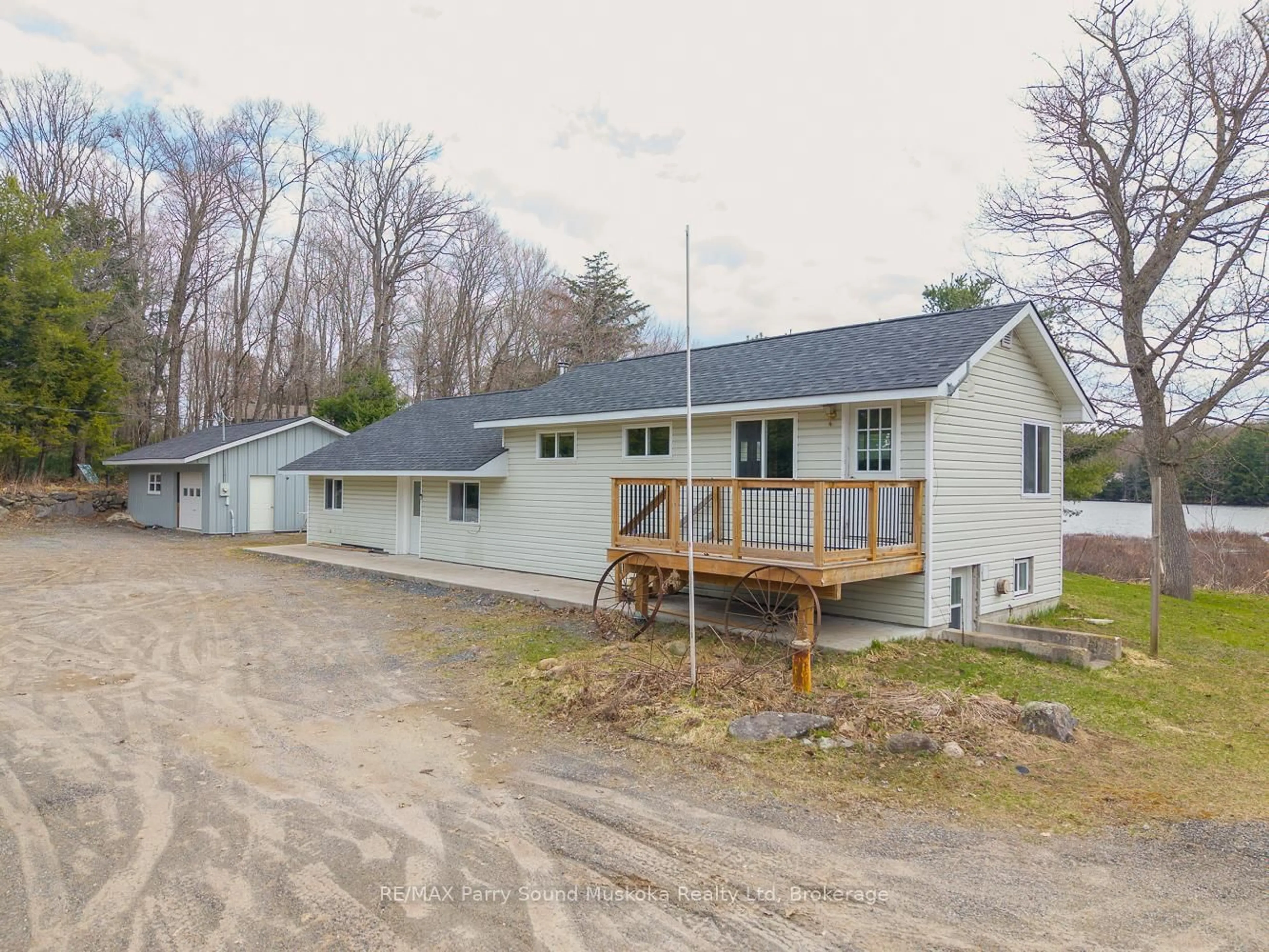 A pic from outside/outdoor area/front of a property/back of a property/a pic from drone, unknown for 92 Blue Lake Rd, Seguin Ontario P2A 2W8