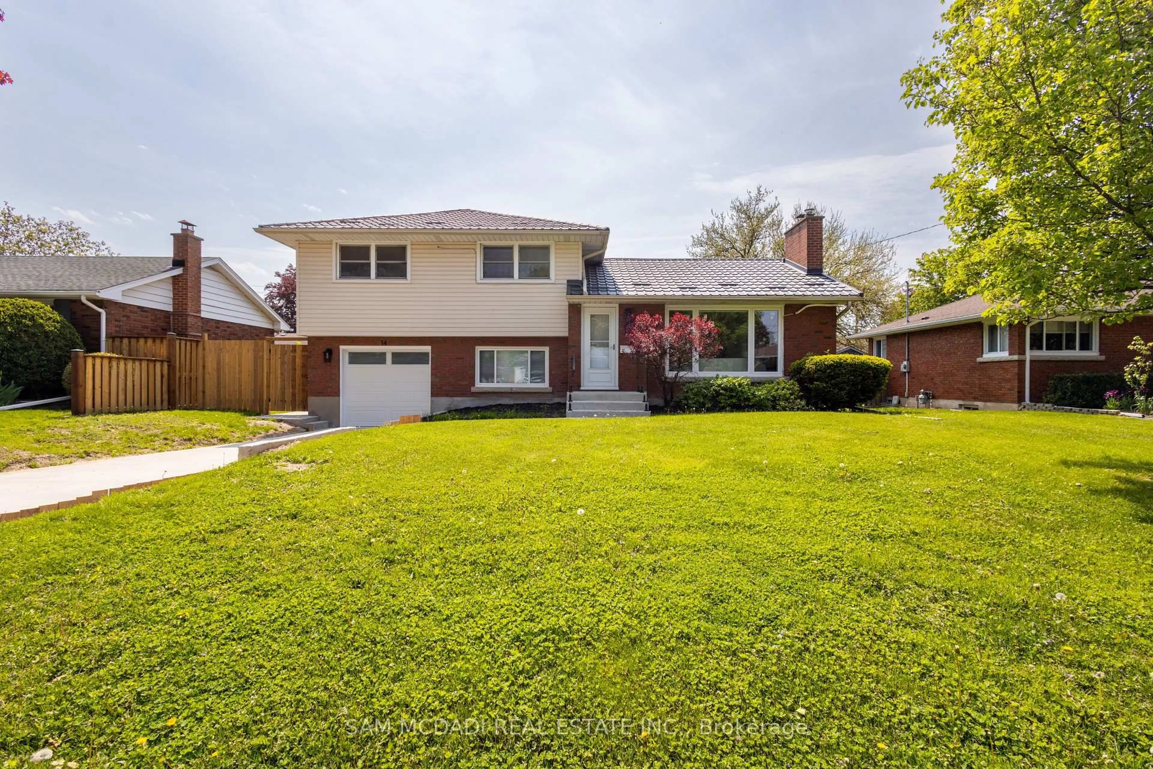 Home with brick exterior material, street for 14 Glencairn Dr, St. Catharines Ontario L2M 2N3