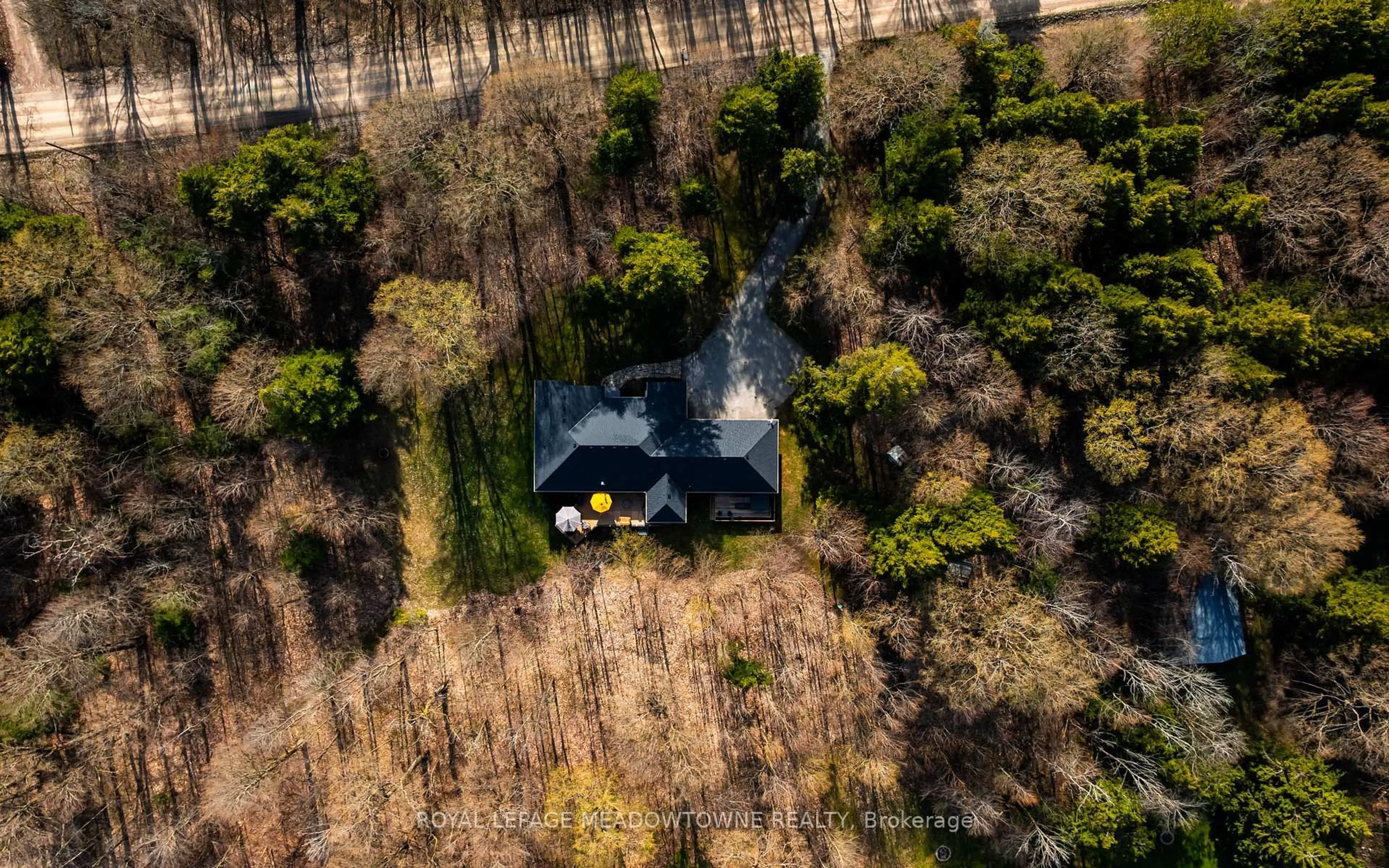 A pic from outside/outdoor area/front of a property/back of a property/a pic from drone, forest/trees view for 834603 4th Line Ehs, Mono Ontario L9W 5Z7