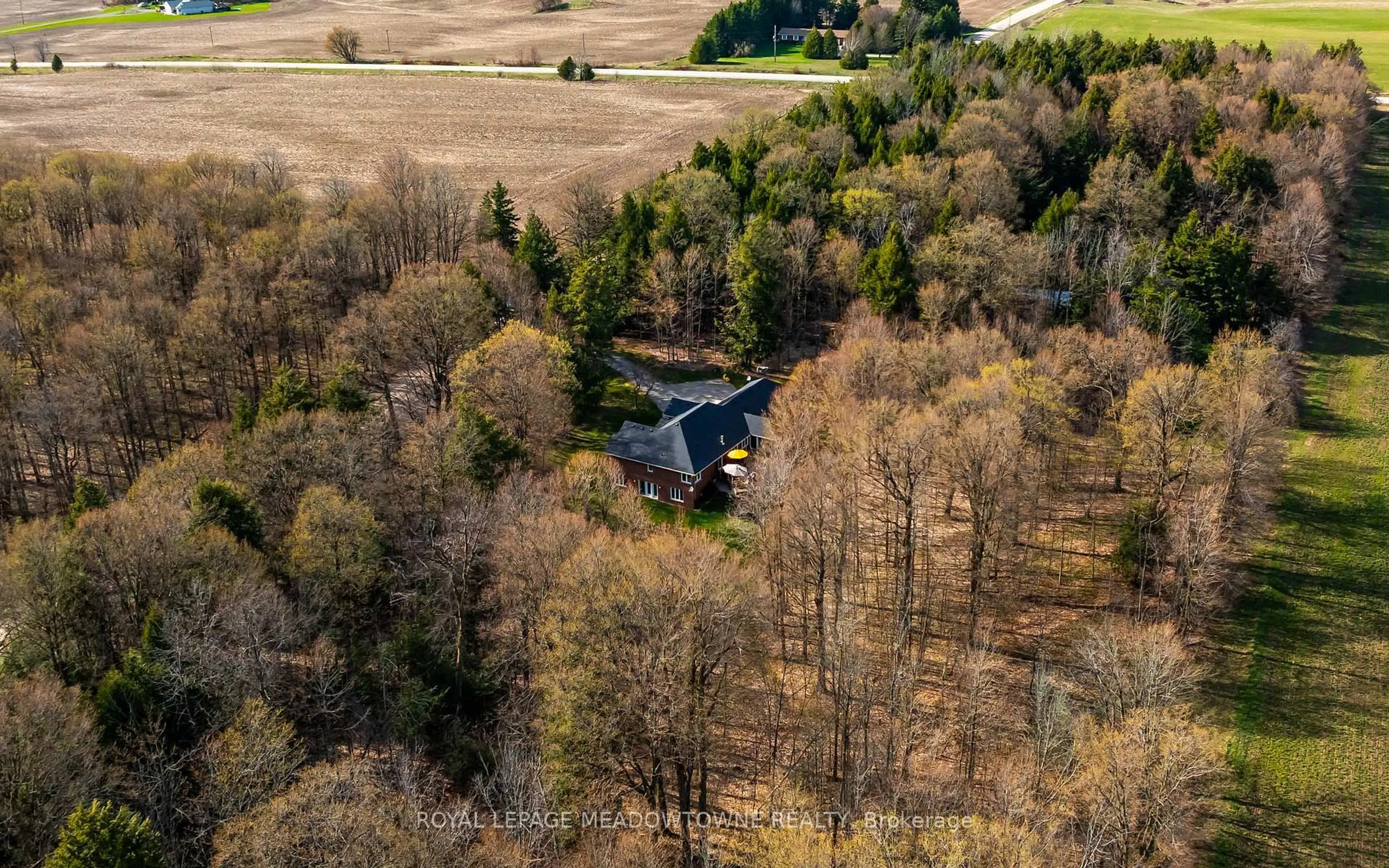 A pic from outside/outdoor area/front of a property/back of a property/a pic from drone, forest/trees view for 834603 4th Line Ehs, Mono Ontario L9W 5Z7