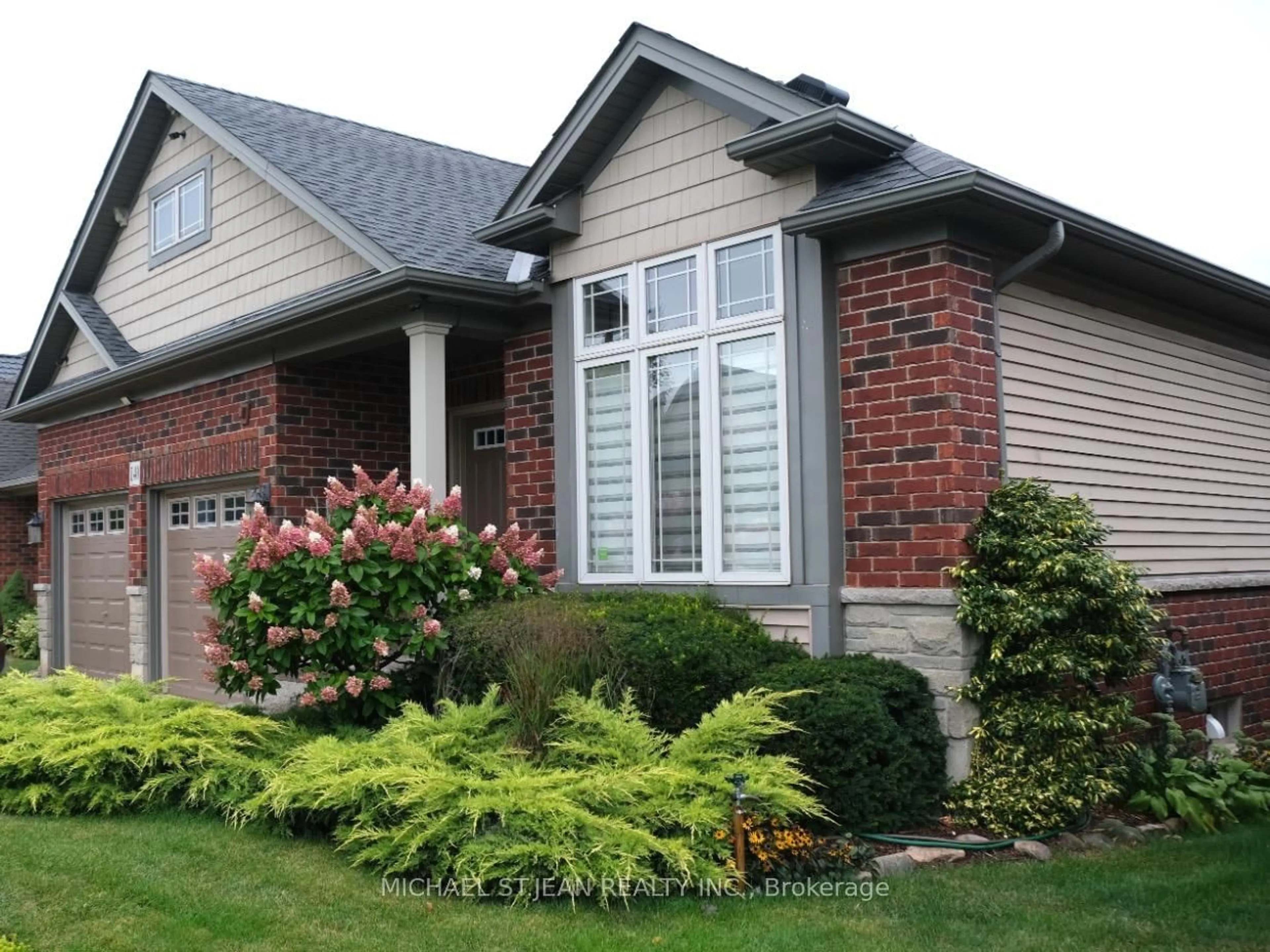 Home with brick exterior material, street for 140 Festival Way, Hamilton Ontario L0R 1C0