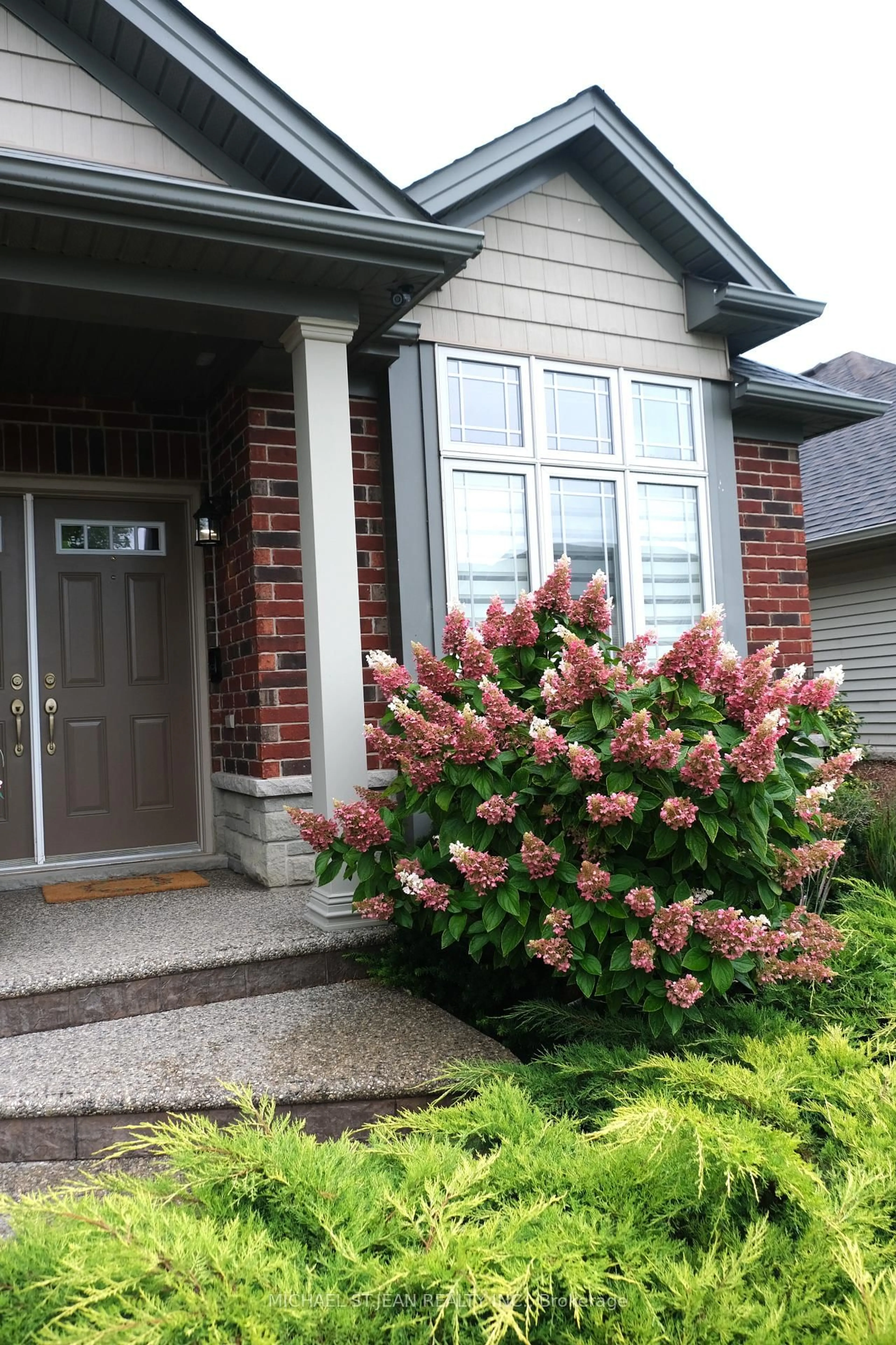 Home with brick exterior material, street for 140 Festival Way, Hamilton Ontario L0R 1C0