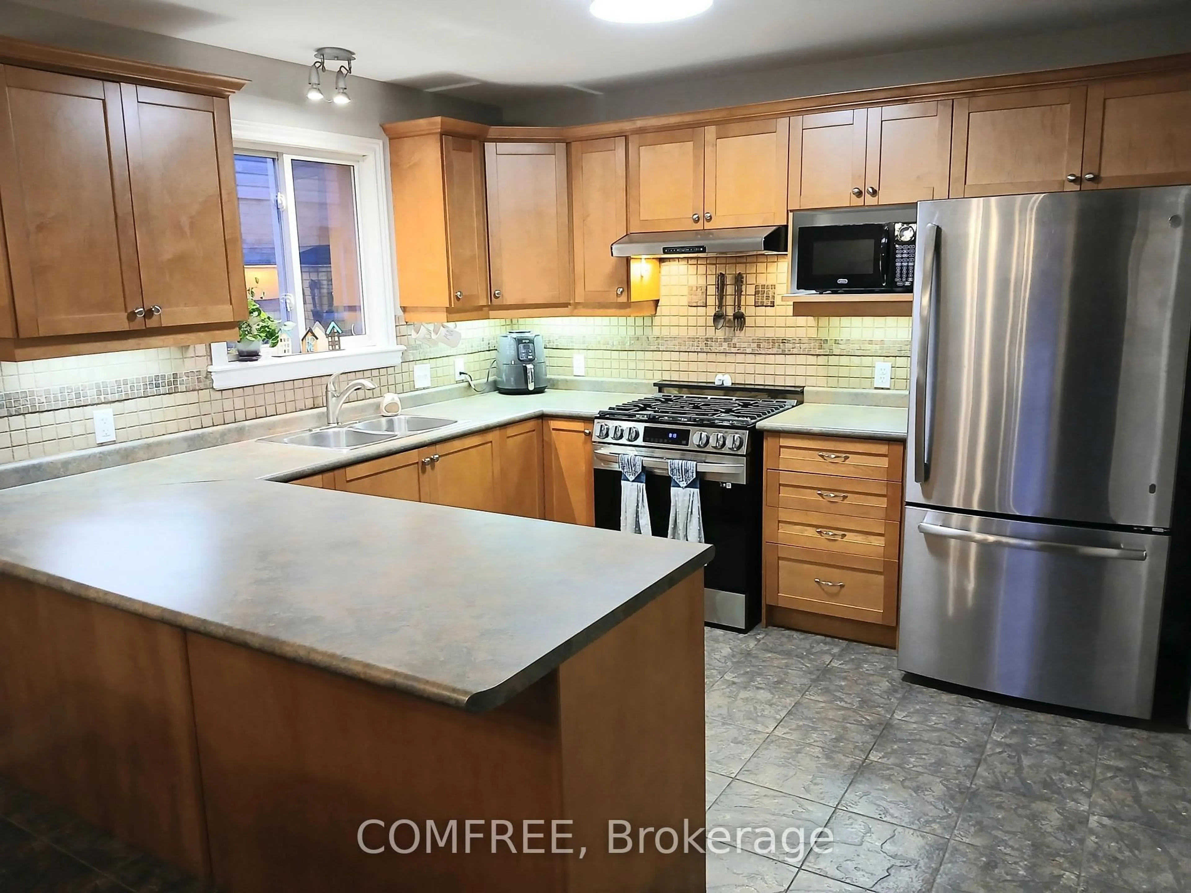 Open concept kitchen, ceramic/tile floor for 1192 South Wenige Dr, London North Ontario N5X 4M3