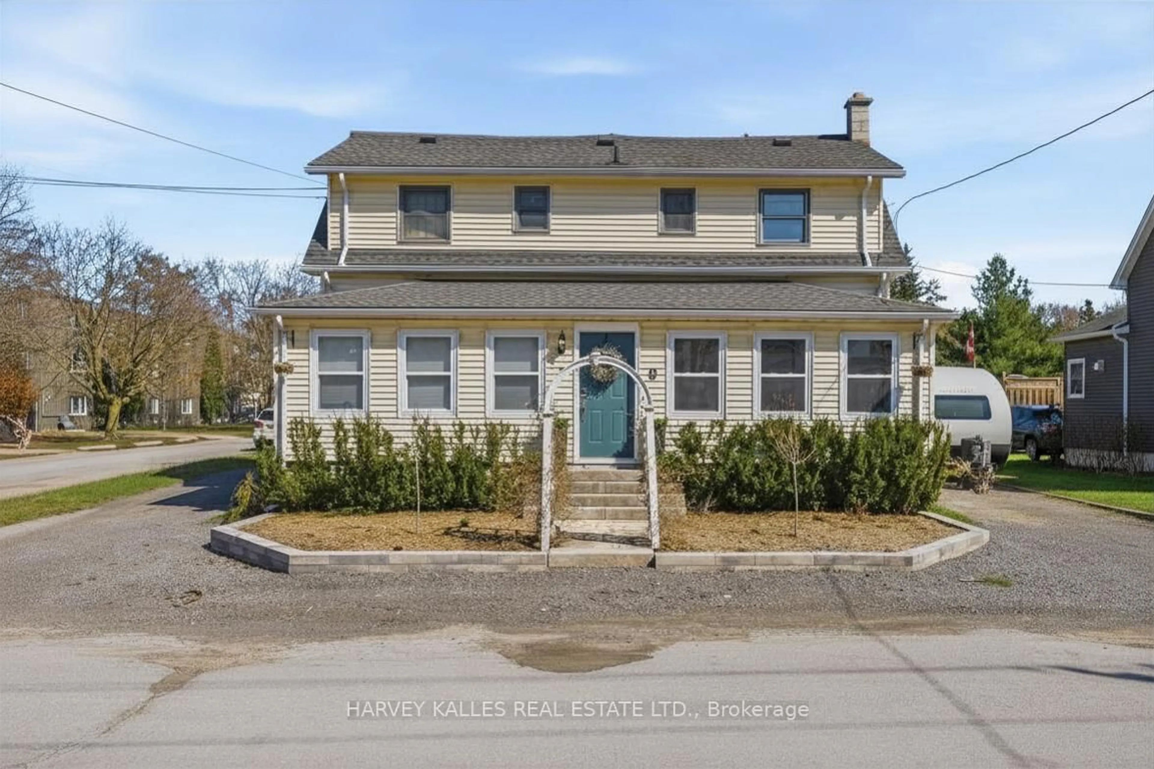 A pic from outside/outdoor area/front of a property/back of a property/a pic from drone, street for 7-9 Spring St, Prince Edward County Ontario K0K 2T0