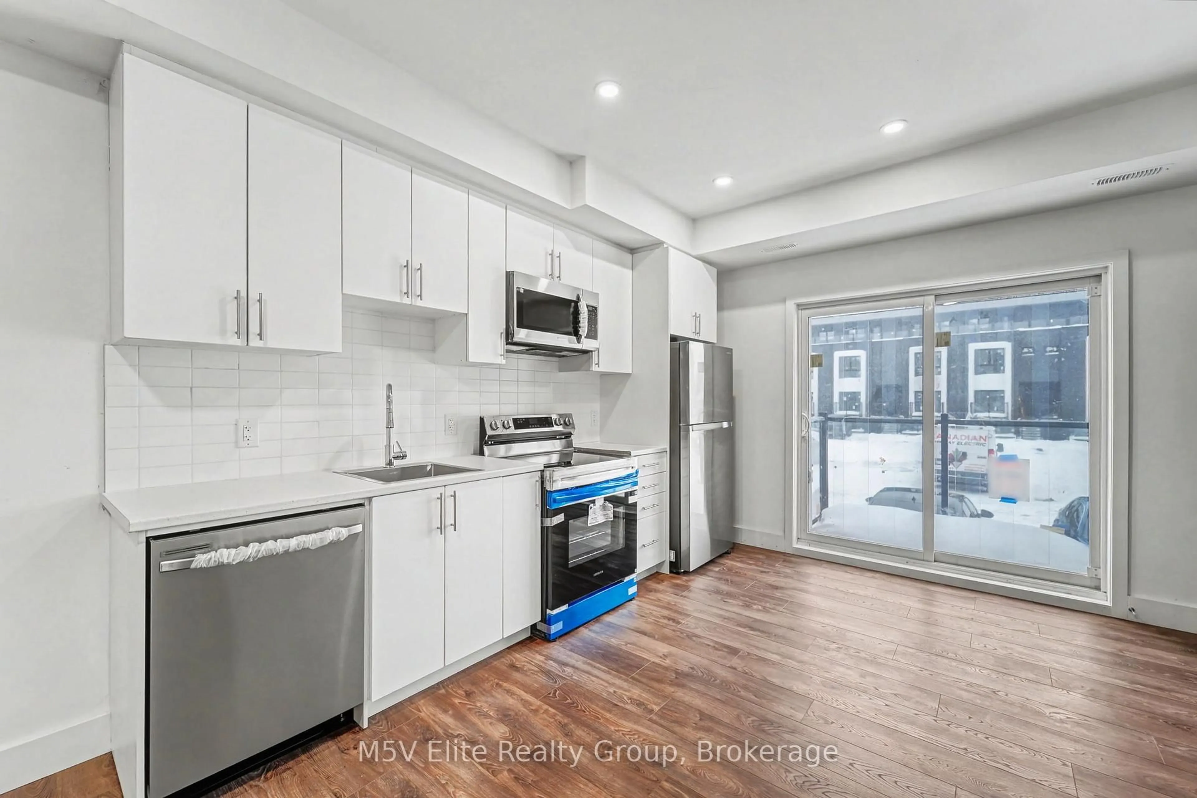 Open concept kitchen, unknown for 6638 McLeod Rd #119, Niagara Falls Ontario L2G 3G5