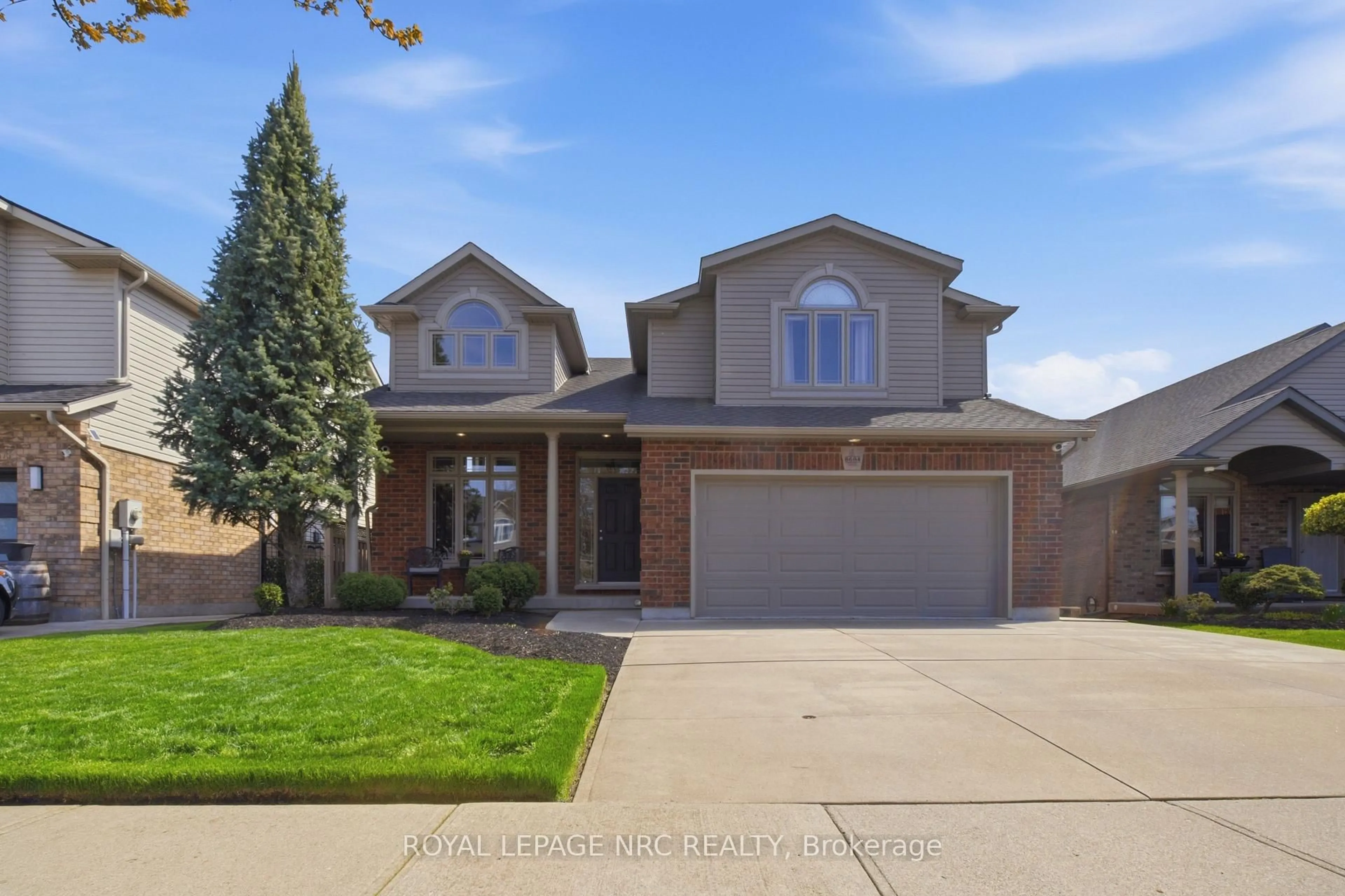 Home with brick exterior material, street for 8684 McGarry Dr, Niagara Falls Ontario L2H 3N7