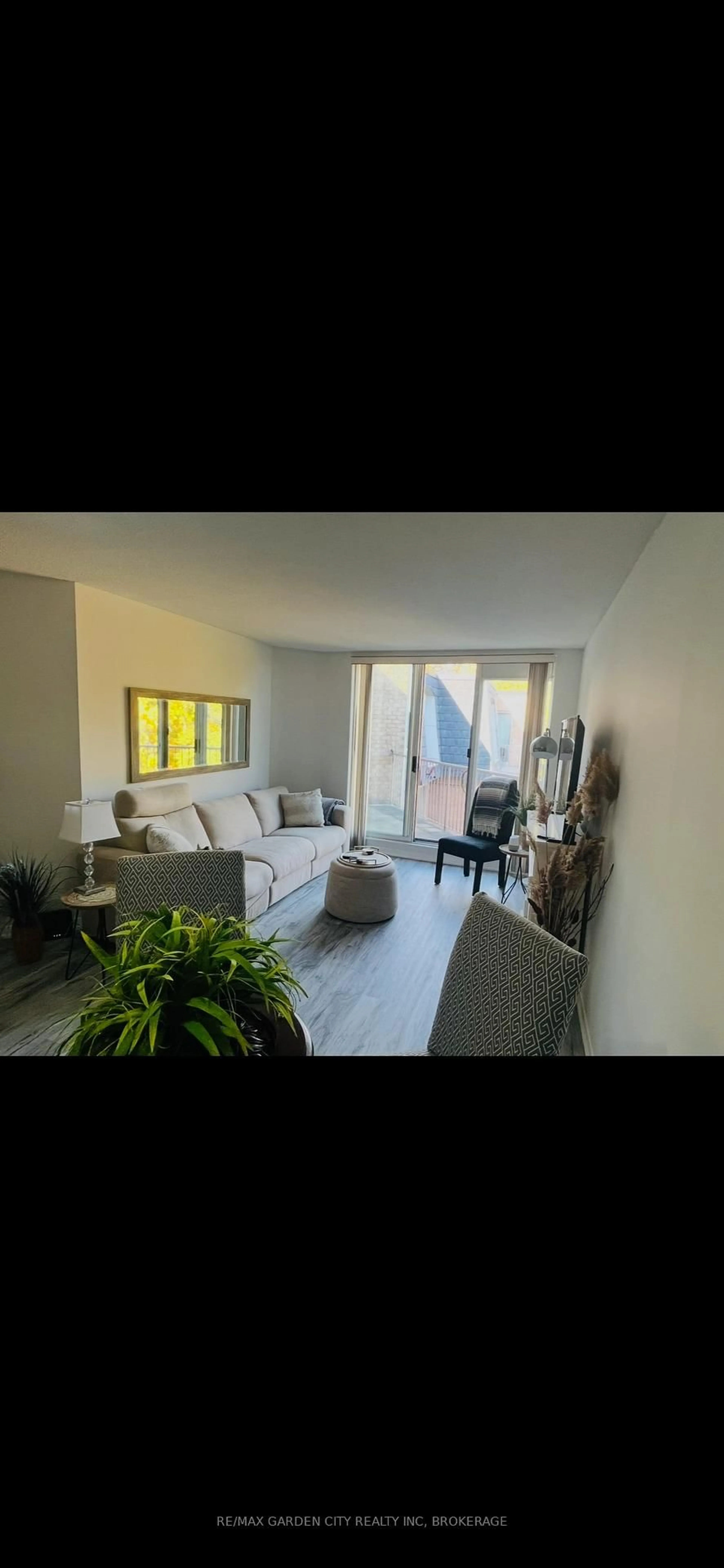 Living room with furniture, unknown for 8111 Forest Glen Dr #504, Niagara Falls Ontario L2H 2Y7