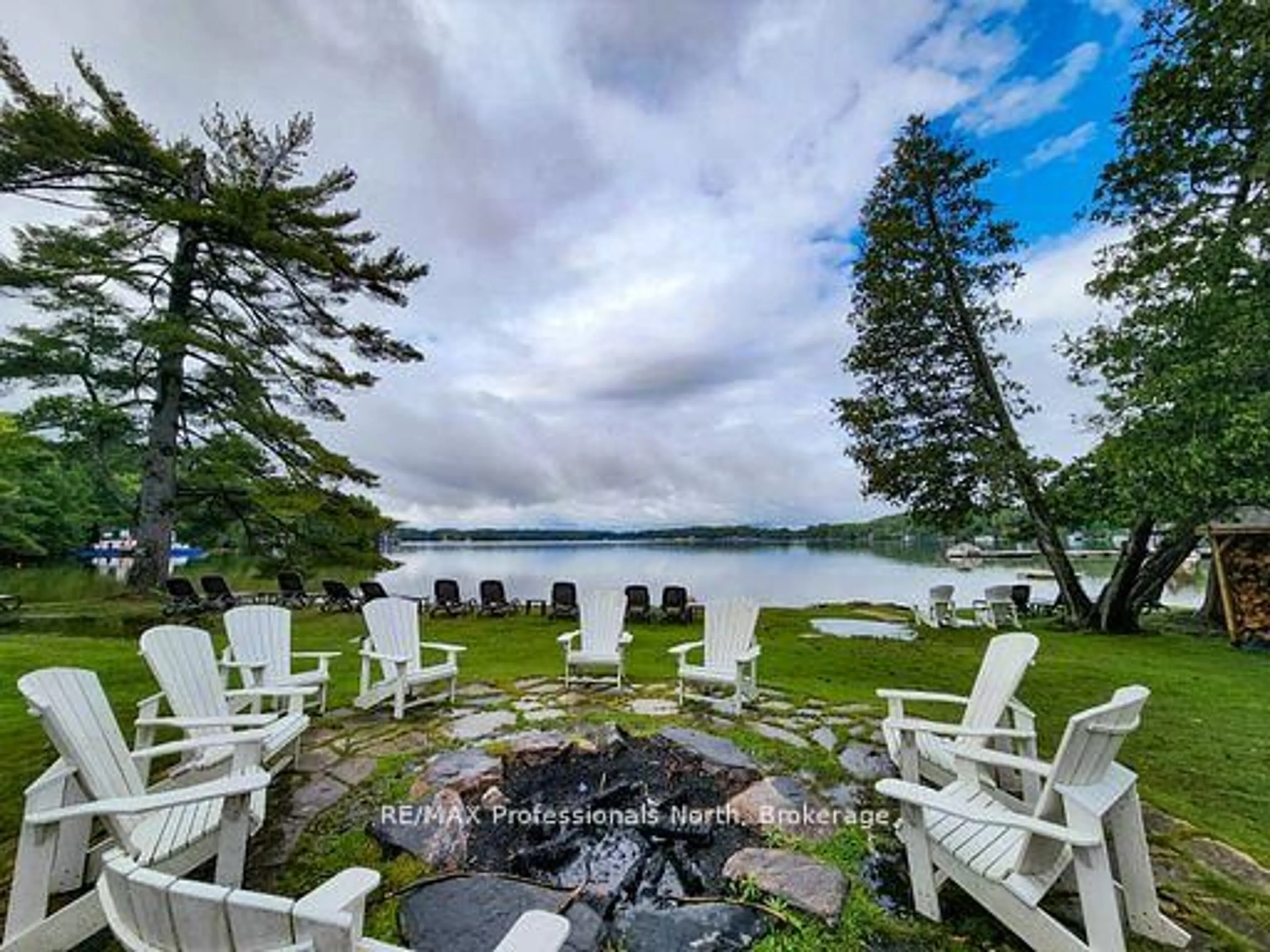 Patio, water/lake/river/ocean view for 3876 MUSKOKA ROAD 118 #Sandfield 2, Week 10, Muskoka Lakes Ontario P0B 1J0