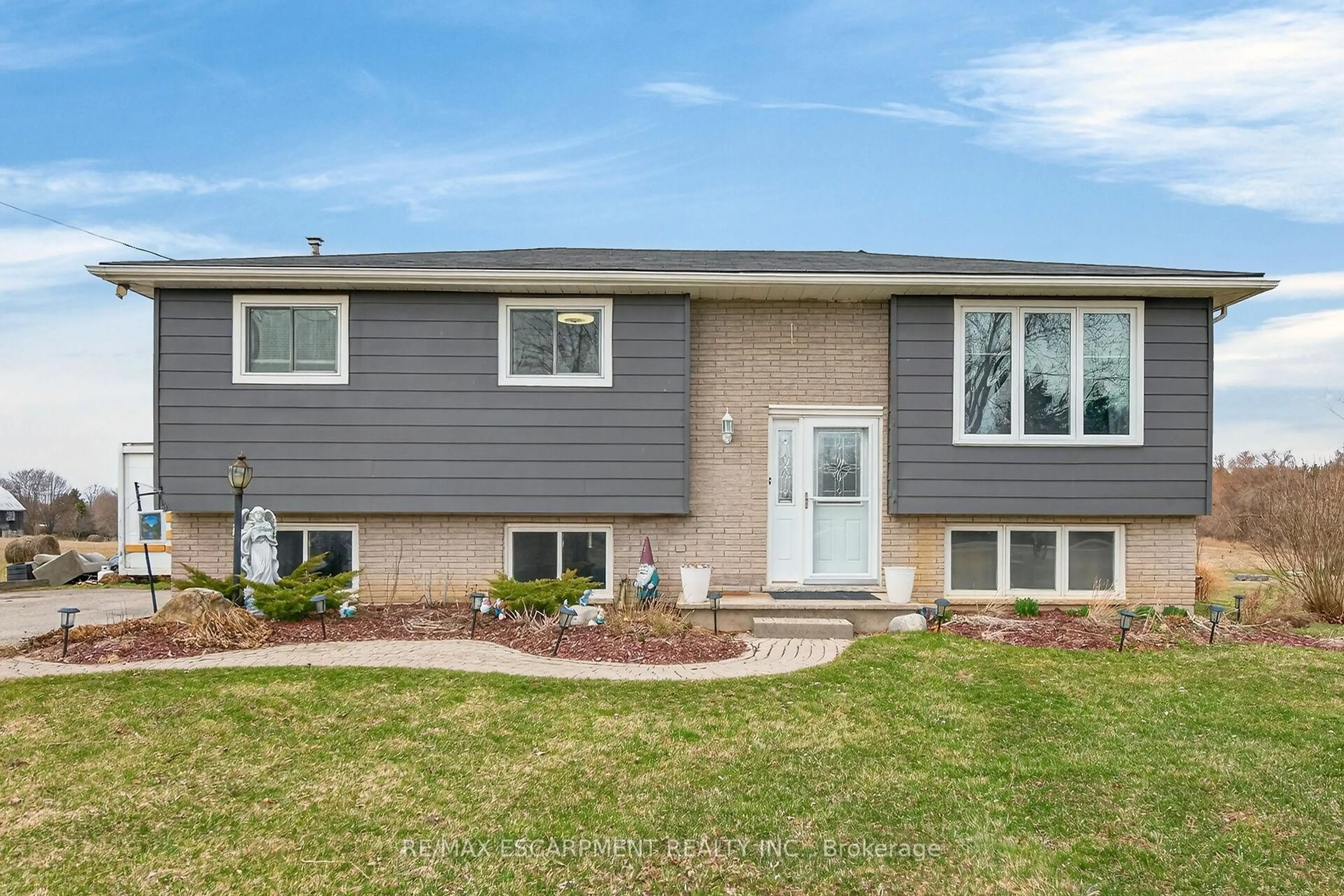 Home with vinyl exterior material, street for 1481 Norfolk County Rd 19 E, Norfolk Ontario N0E 1Z0