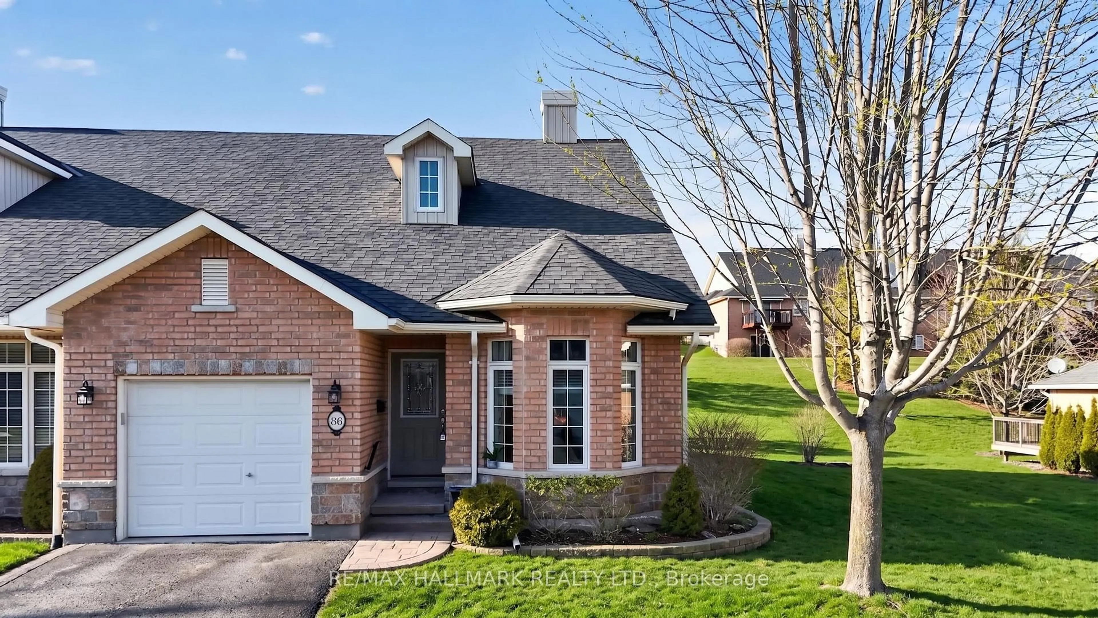 Home with brick exterior material, street for 86 VILLAGE Cres #105, Peterborough Ontario K9J 8S7