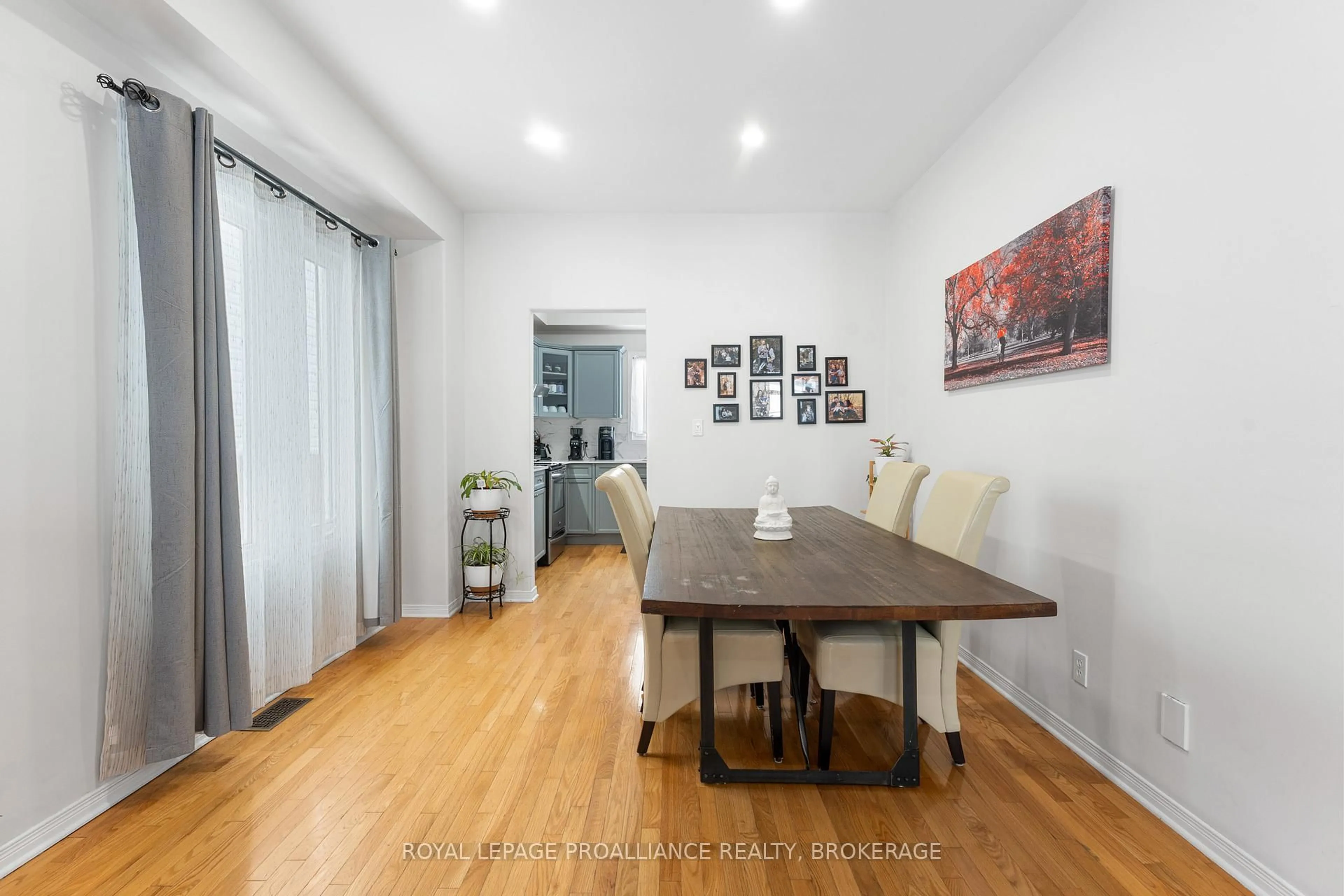 Dining room, wood/laminate floor for 975 Bluffwood Ave, Kingston Ontario K7K 7K5