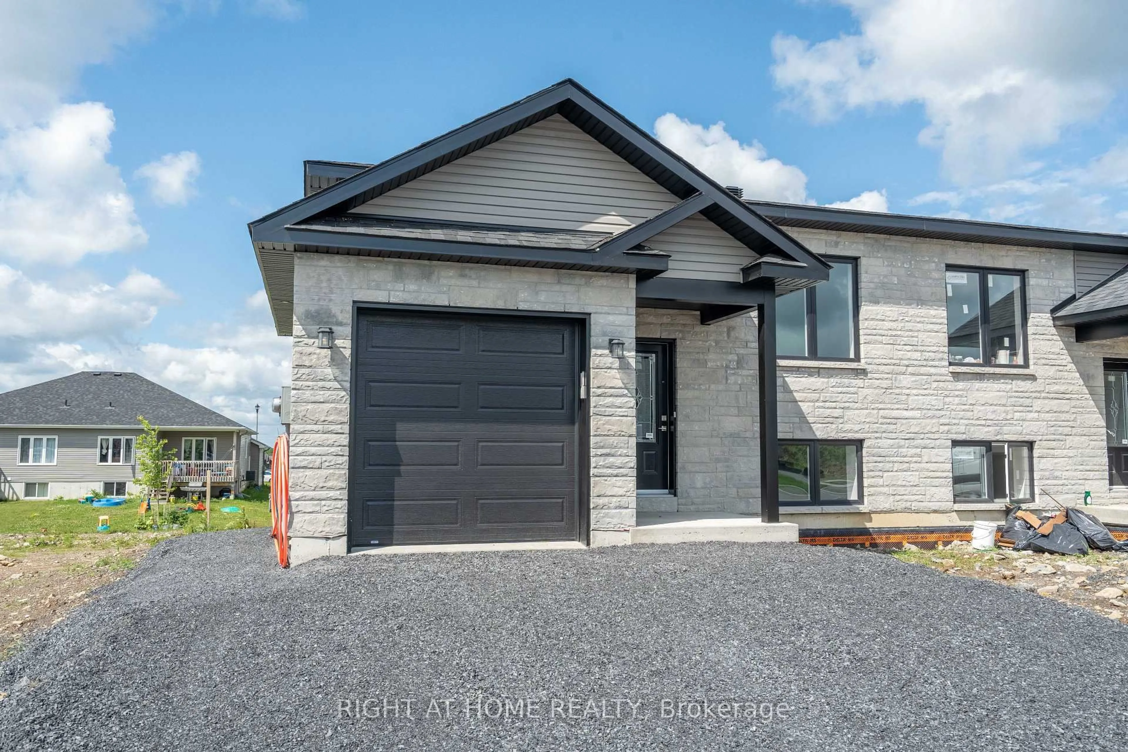 Home with brick exterior material, street for 157/157A Woodland Dr, Cornwall Ontario K6H 0J9