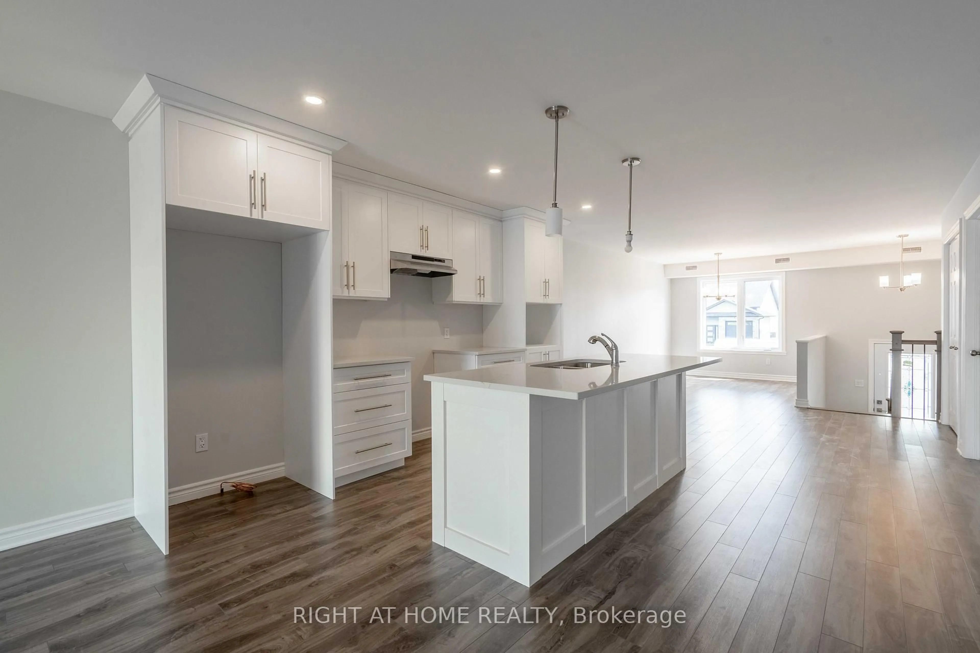 Open concept kitchen, wood/laminate floor for 157/157A Woodland Dr, Cornwall Ontario K6H 0J9