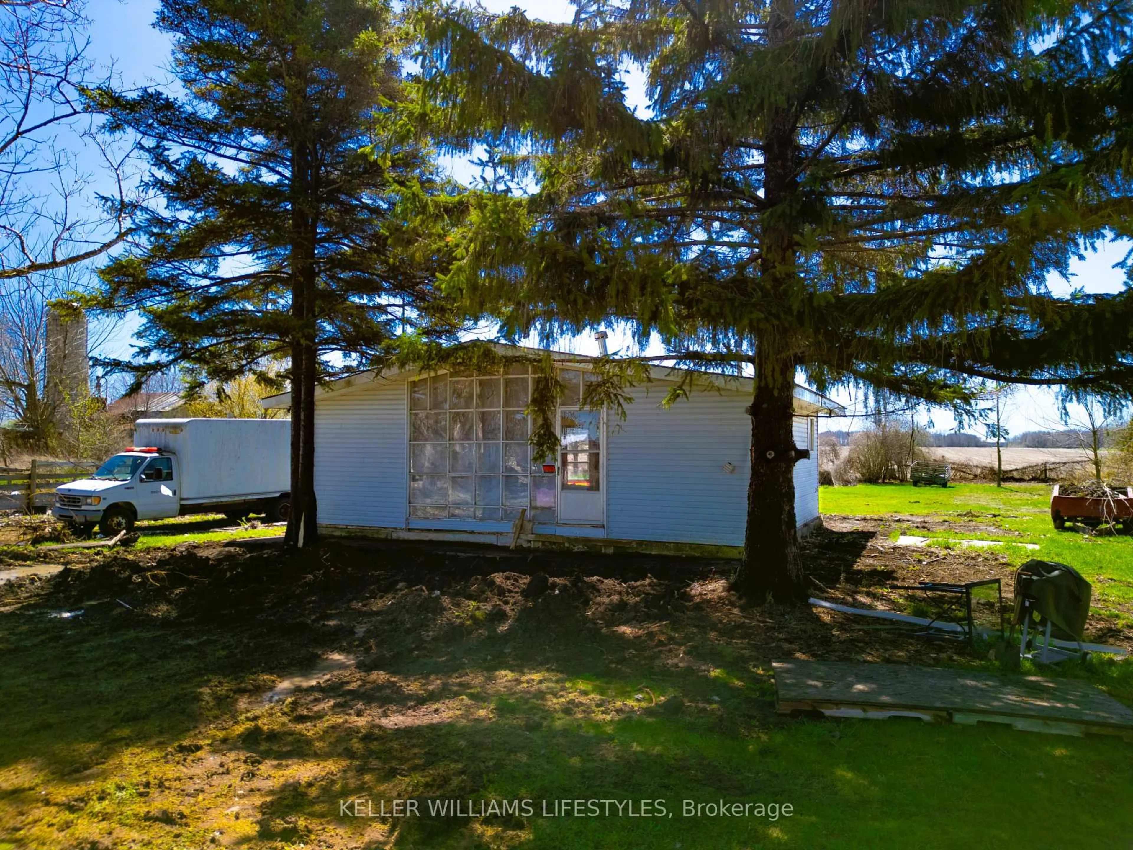 A pic from outside/outdoor area/front of a property/back of a property/a pic from drone, unknown for 3319 London Line, Plympton-Wyoming Ontario N0N 1T0