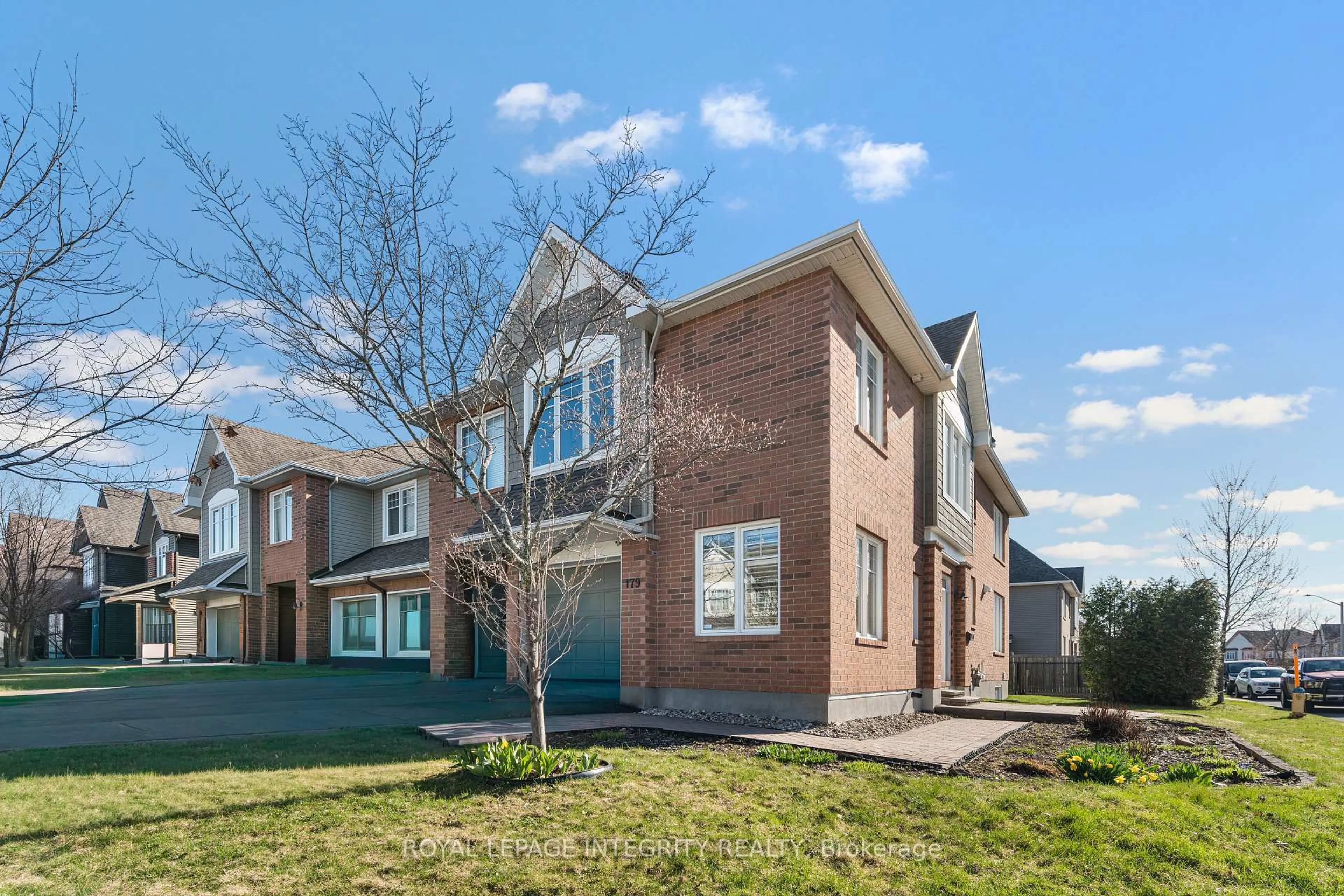 Home with brick exterior material, street for 179 Flat Sedge Cres, Ottawa Ontario K1T 0G9
